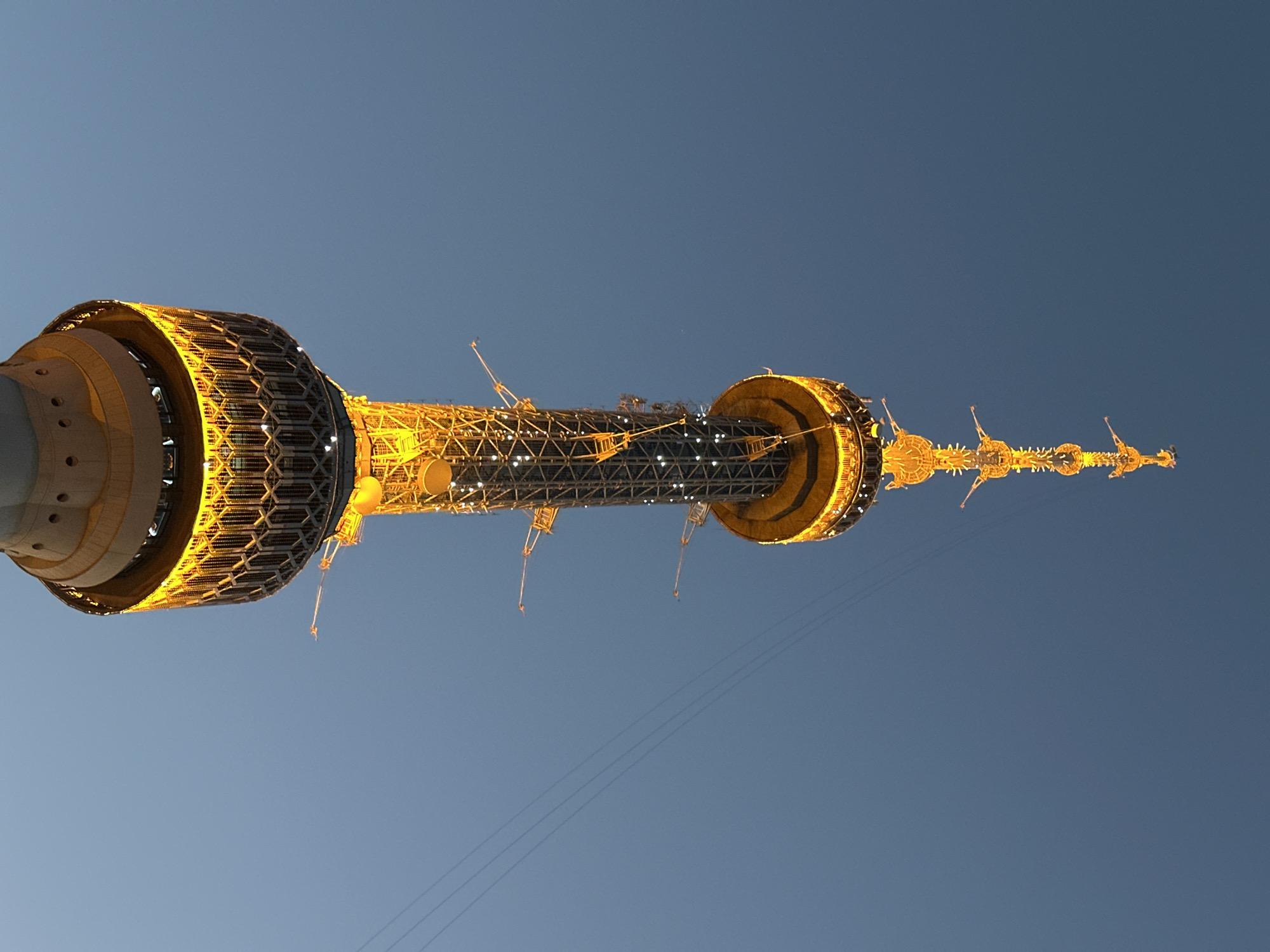Tashkent TV Tower and city landmarks at dusk