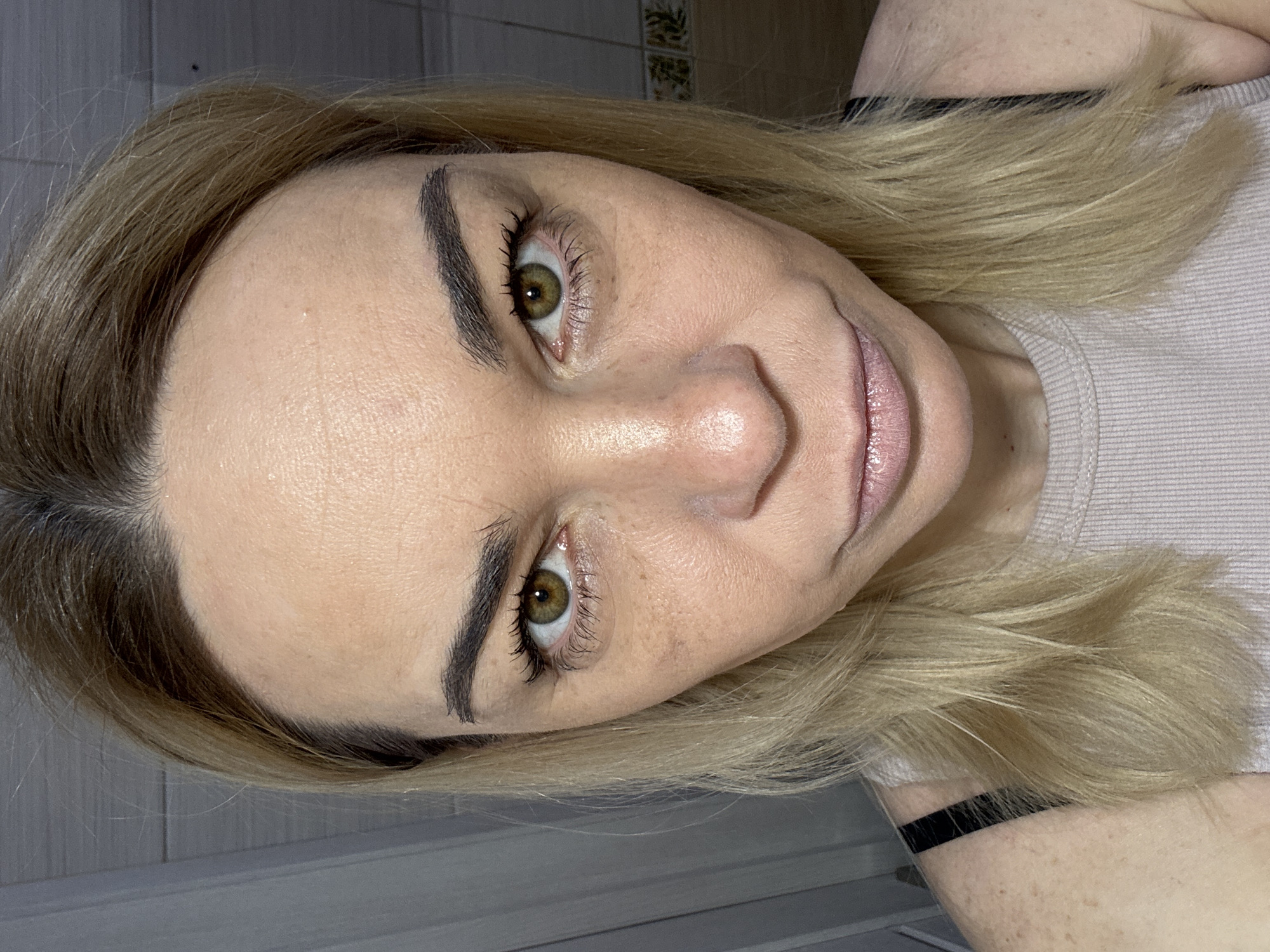 Woman in light top observed indoors in Vsevolozhsk