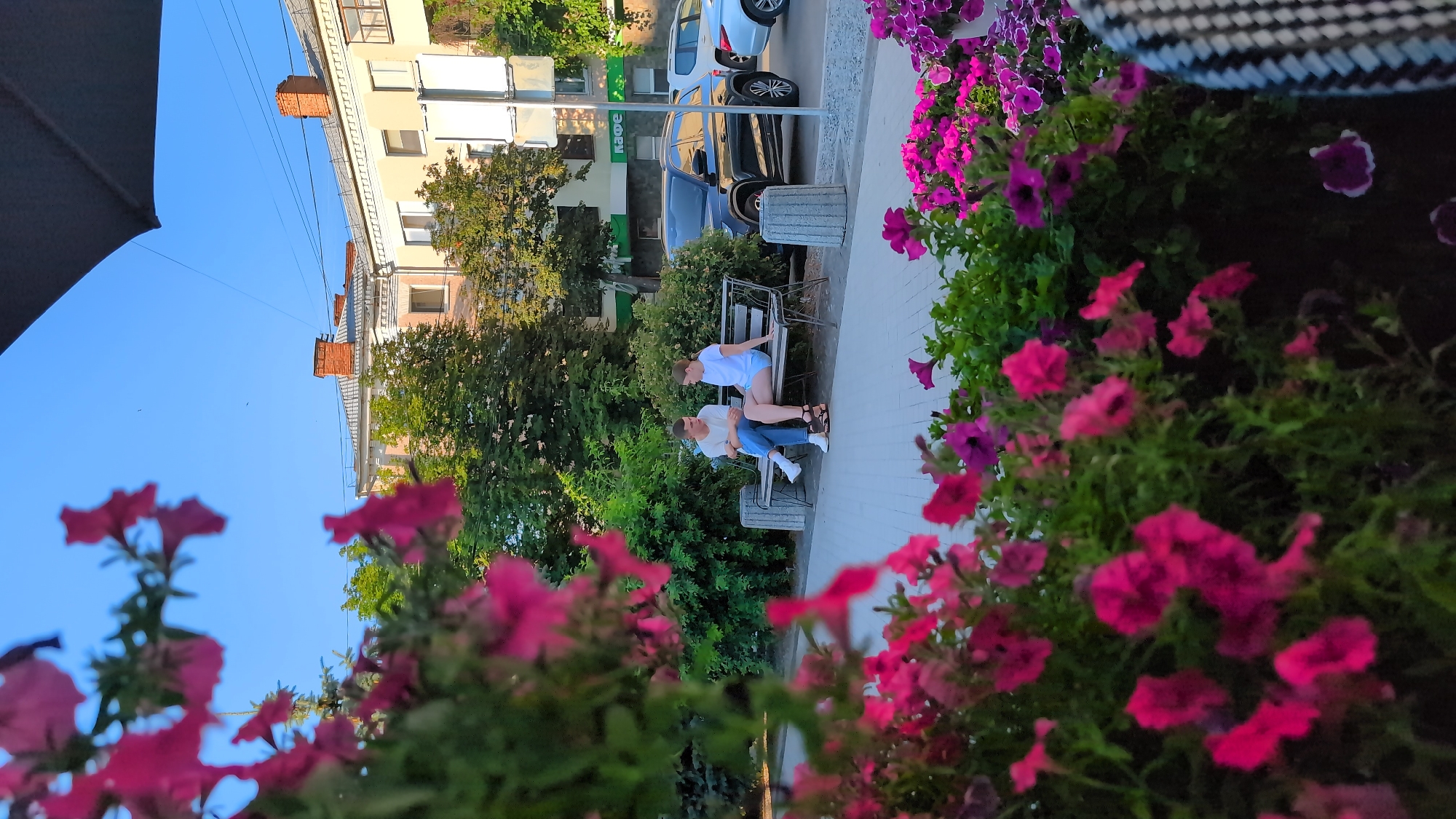 Afternoon at a European outdoor café, mid-July