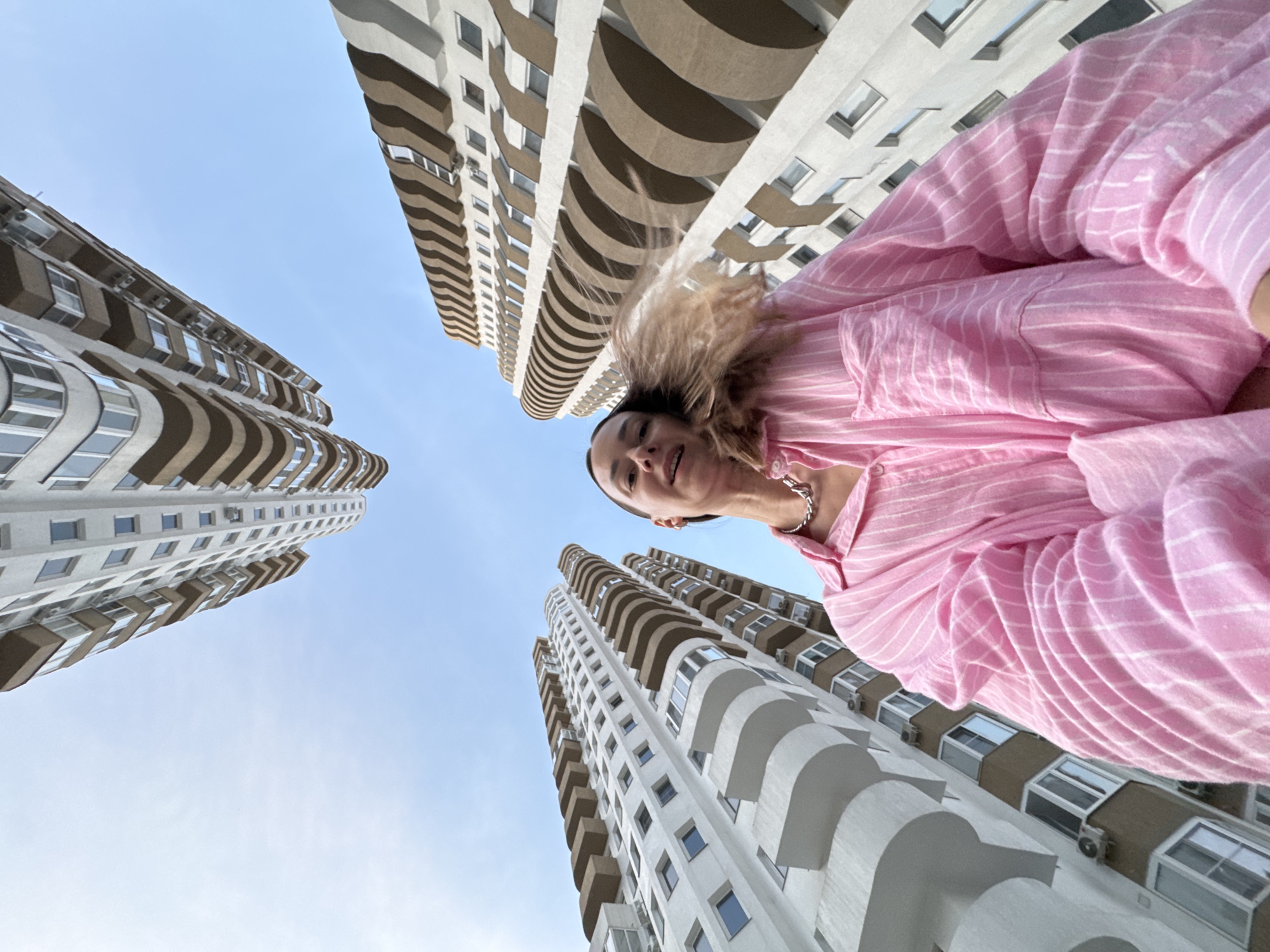 Photo session in Sochi apartment district during golden hour