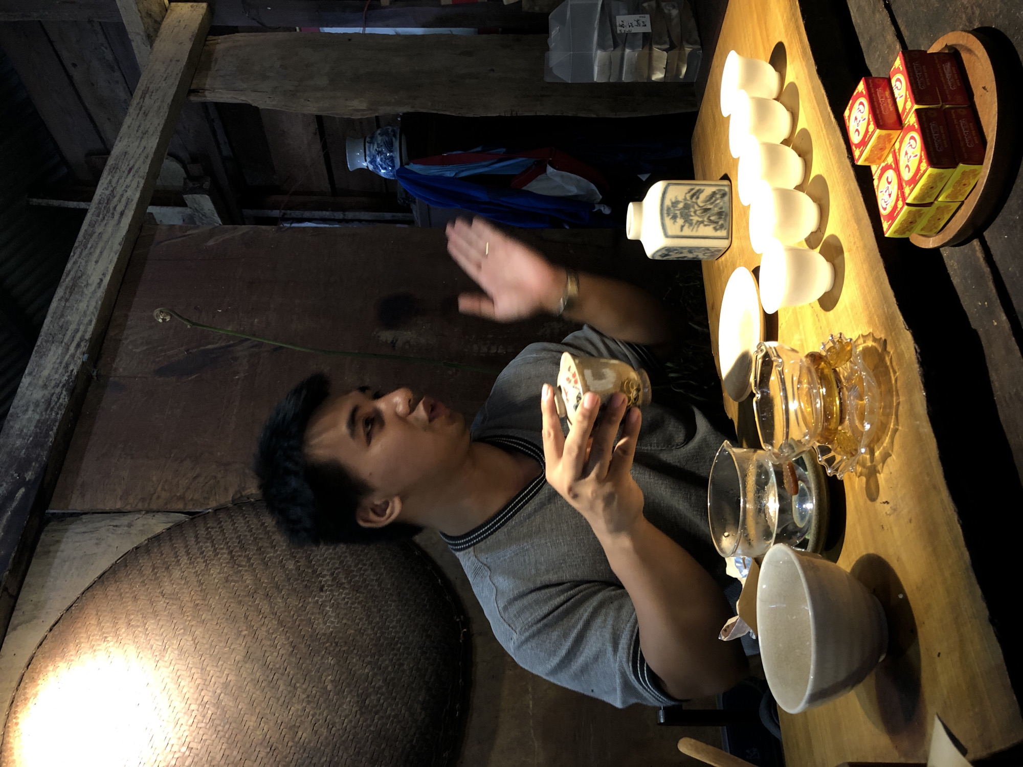 Tea tasting session at a rustic table in B'Lao, Vietnam