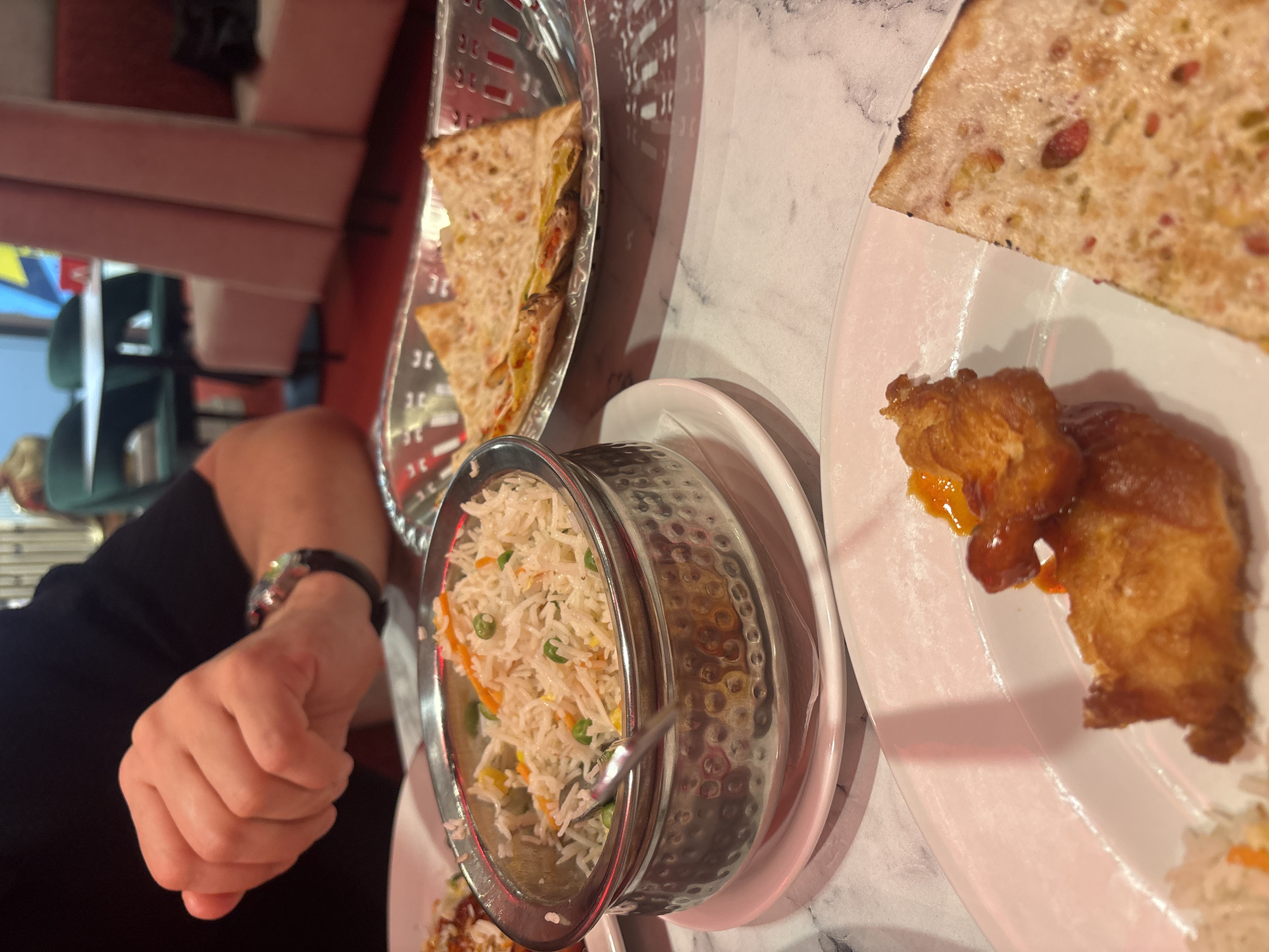 Lunch spread at a Riga restaurant with infused water and dessert