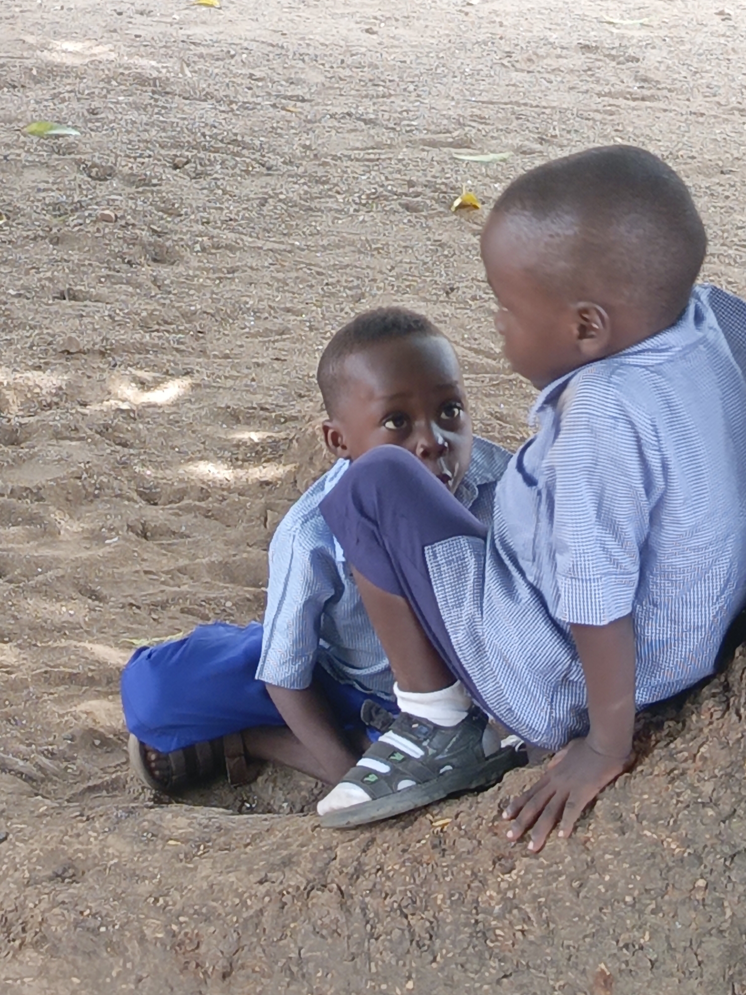 School children play in sunny Akwanga schoolyard