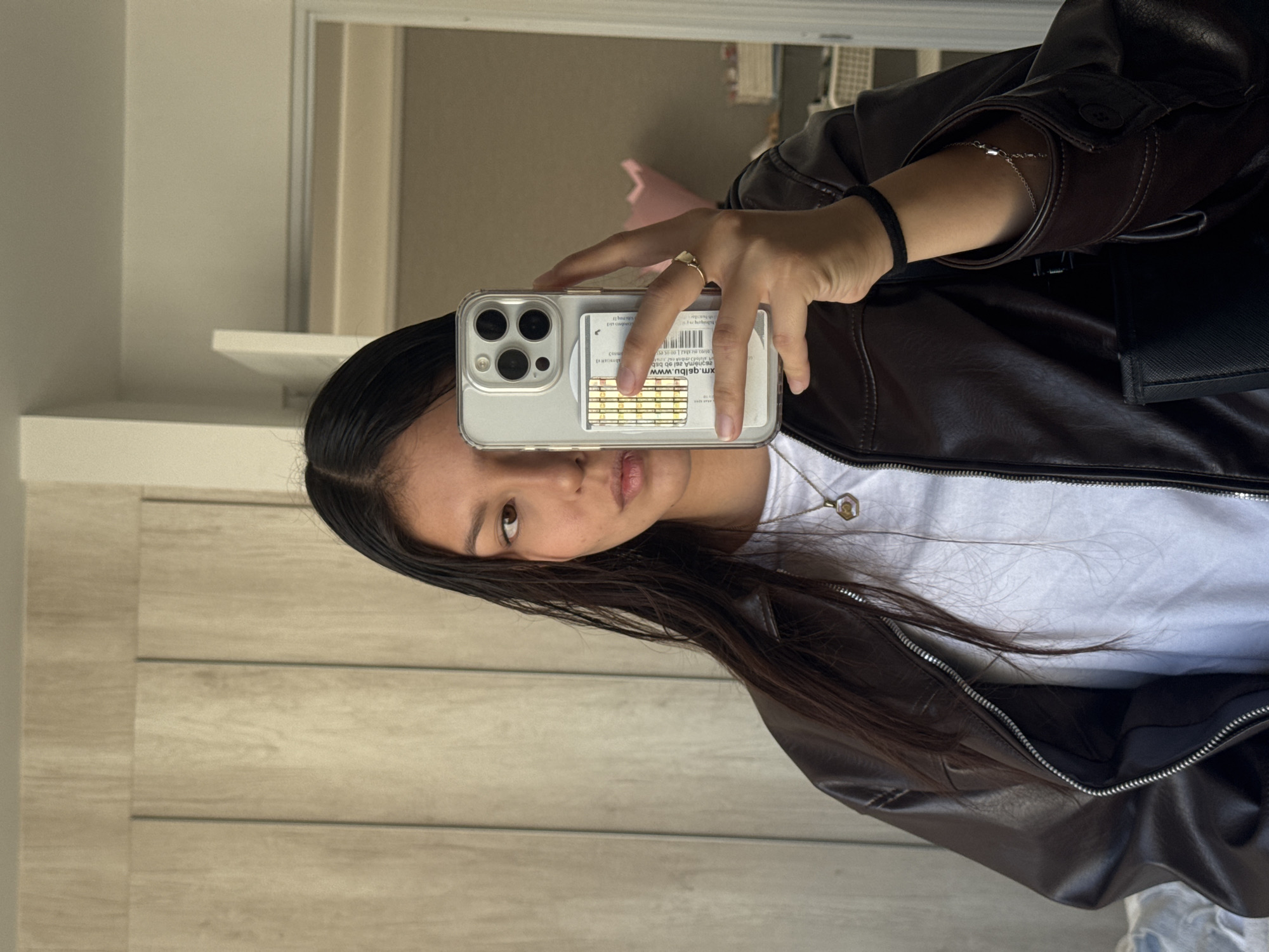 Woman takes mirror selfies in San Francisco Ocotlán, Mexico