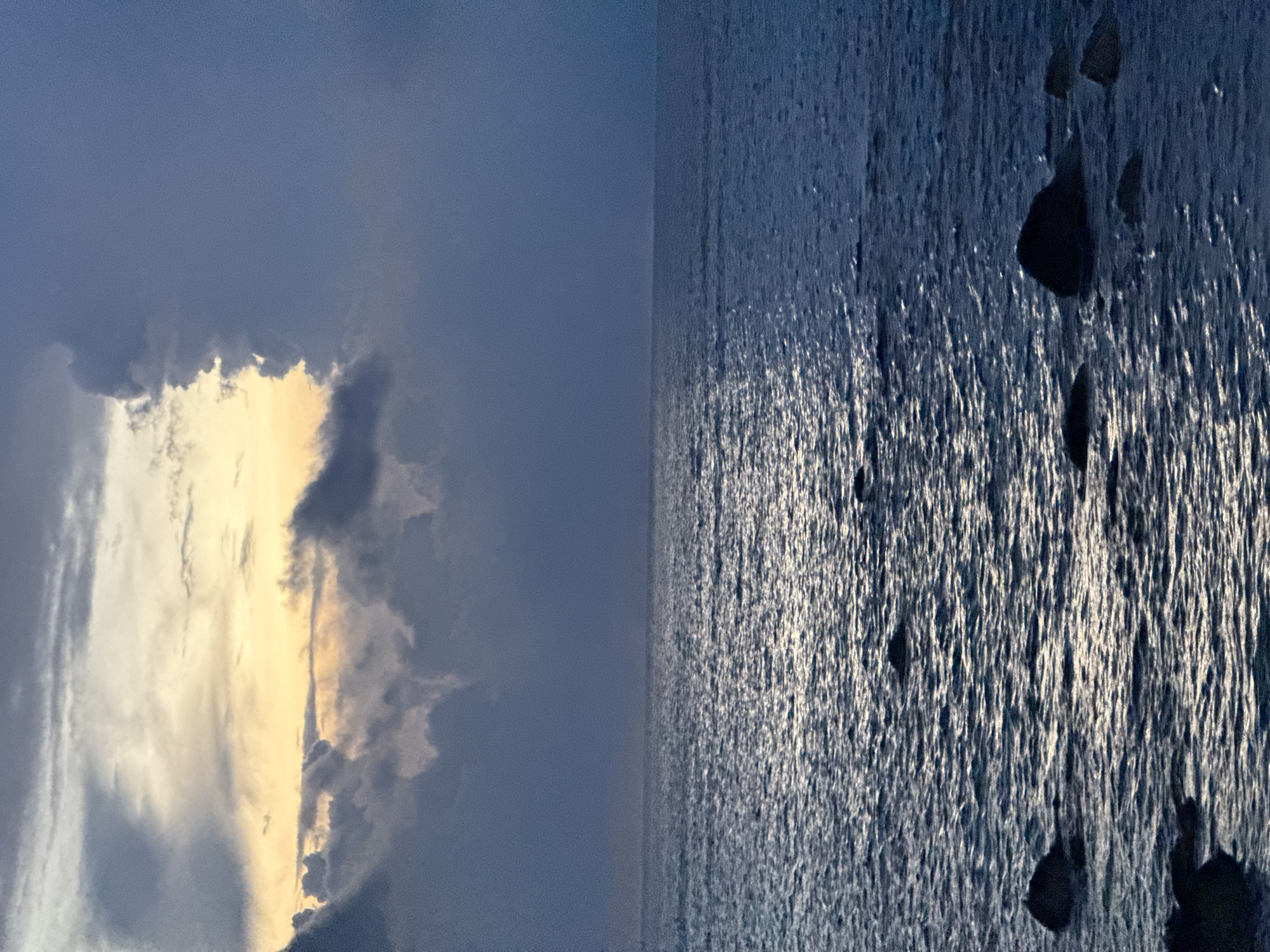 Dusk seascape along the rocky coast of Lý Sơn Island