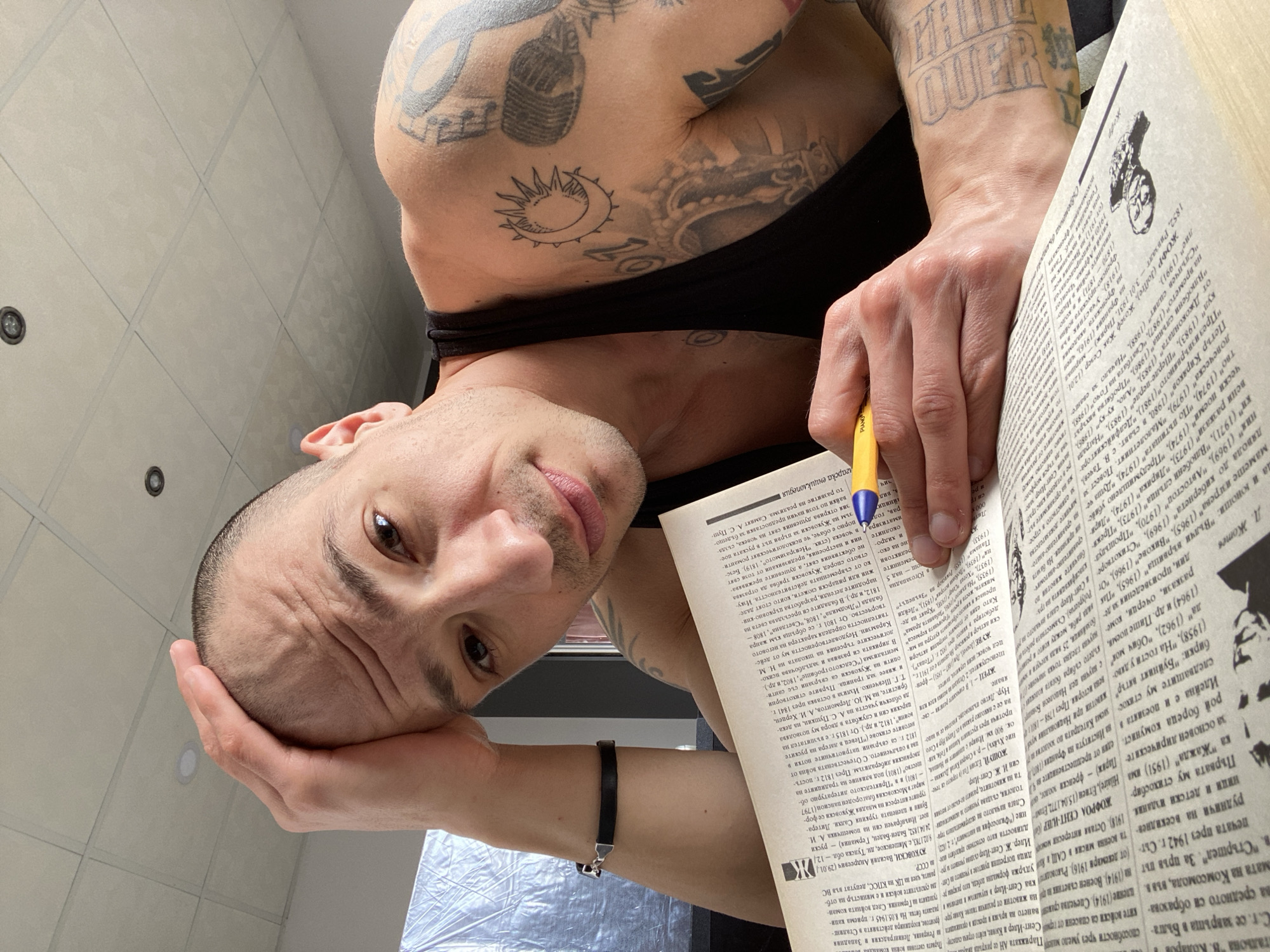 Tattooed man photographed airborne in Pleven, Bulgaria