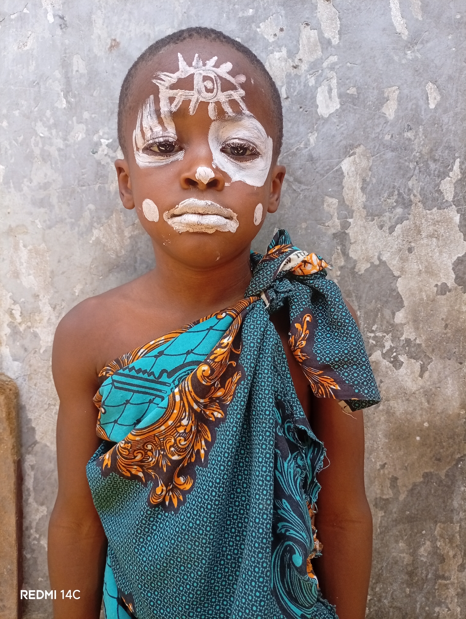 Boy with traditional face paint observed in Maiduguri, Nigeria