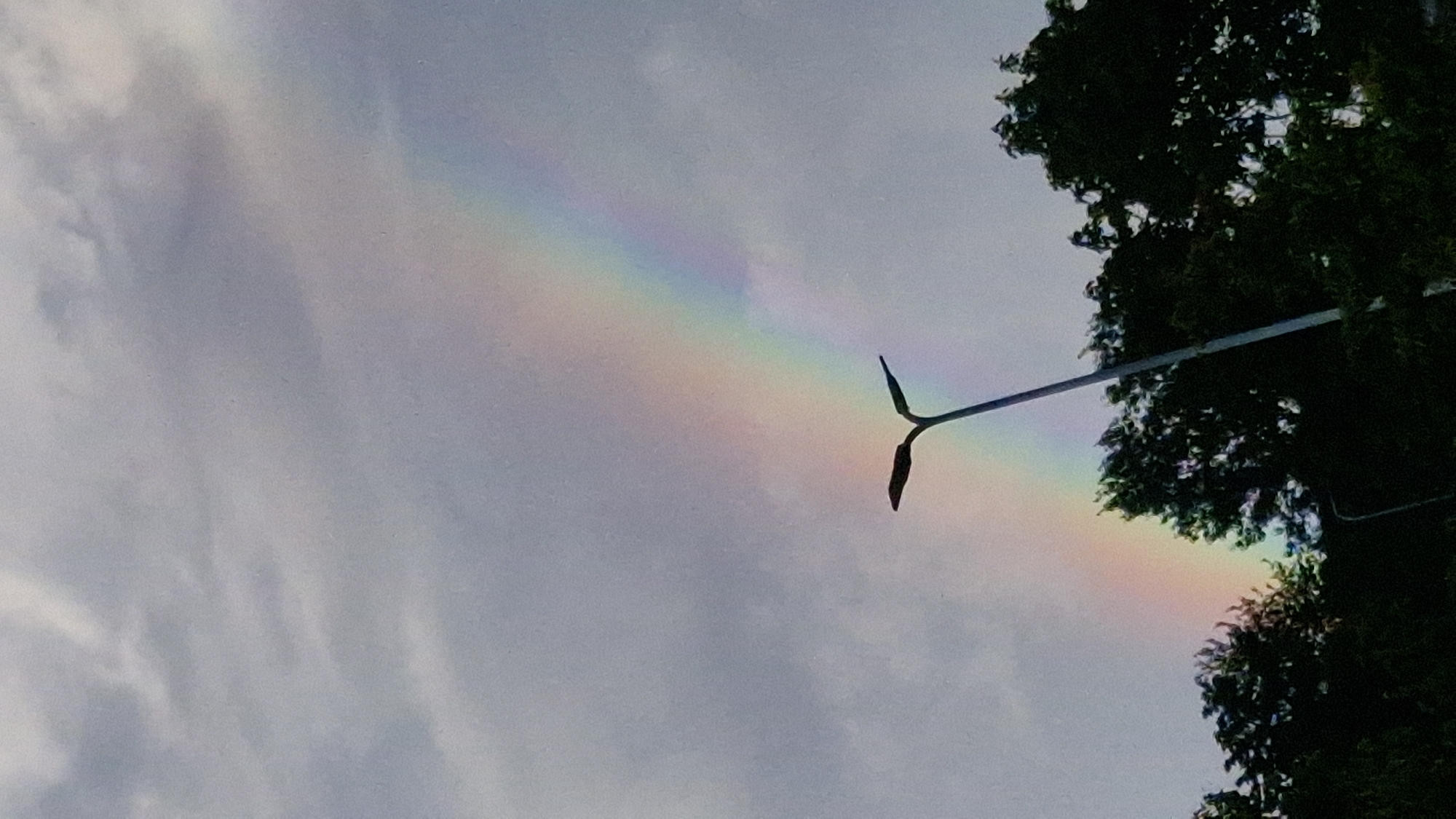 Rainbow over Riga's grey summer sky, July 2026