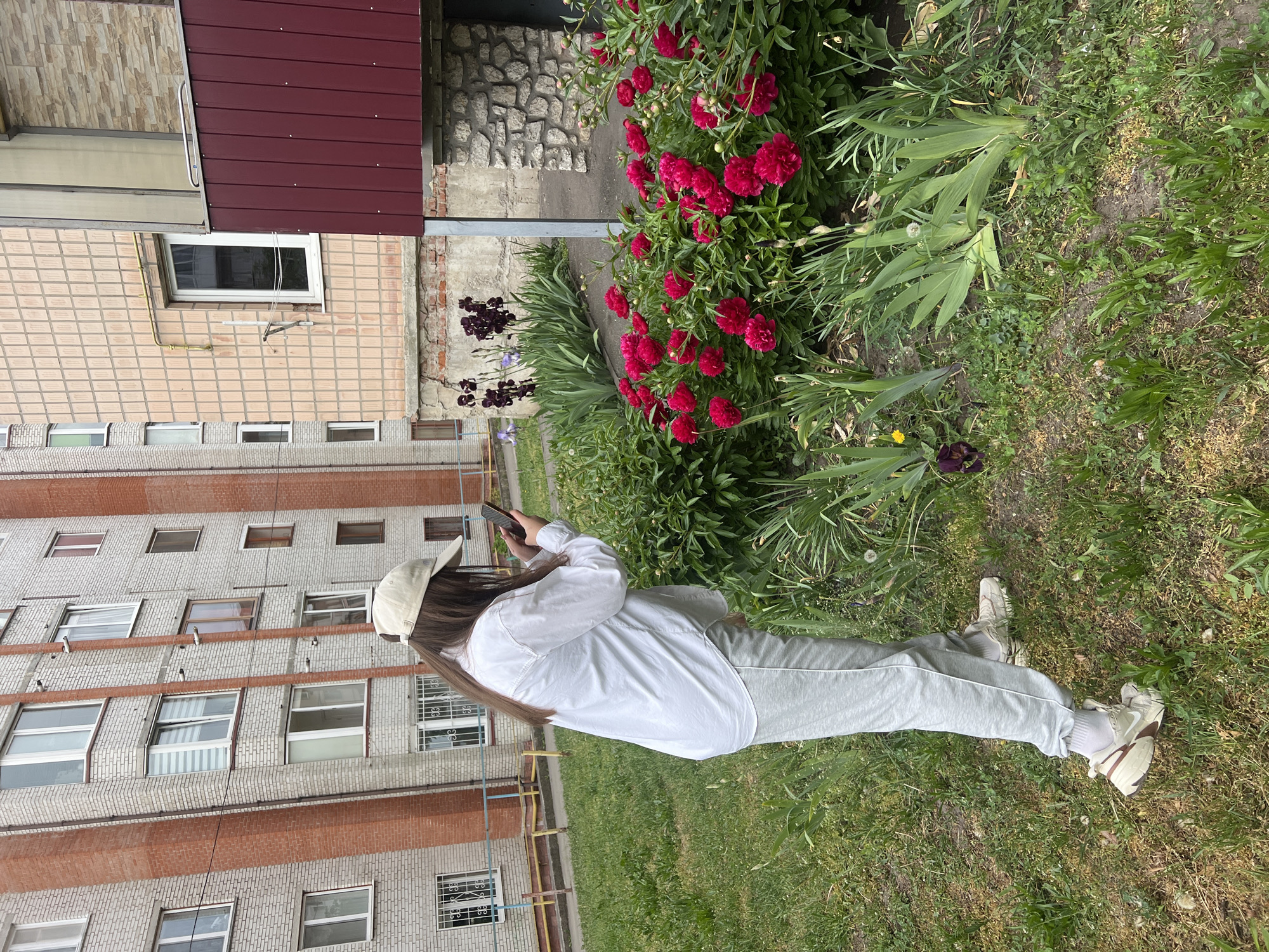 Morning walk through Ternopil captures flowers, church, abandoned cars