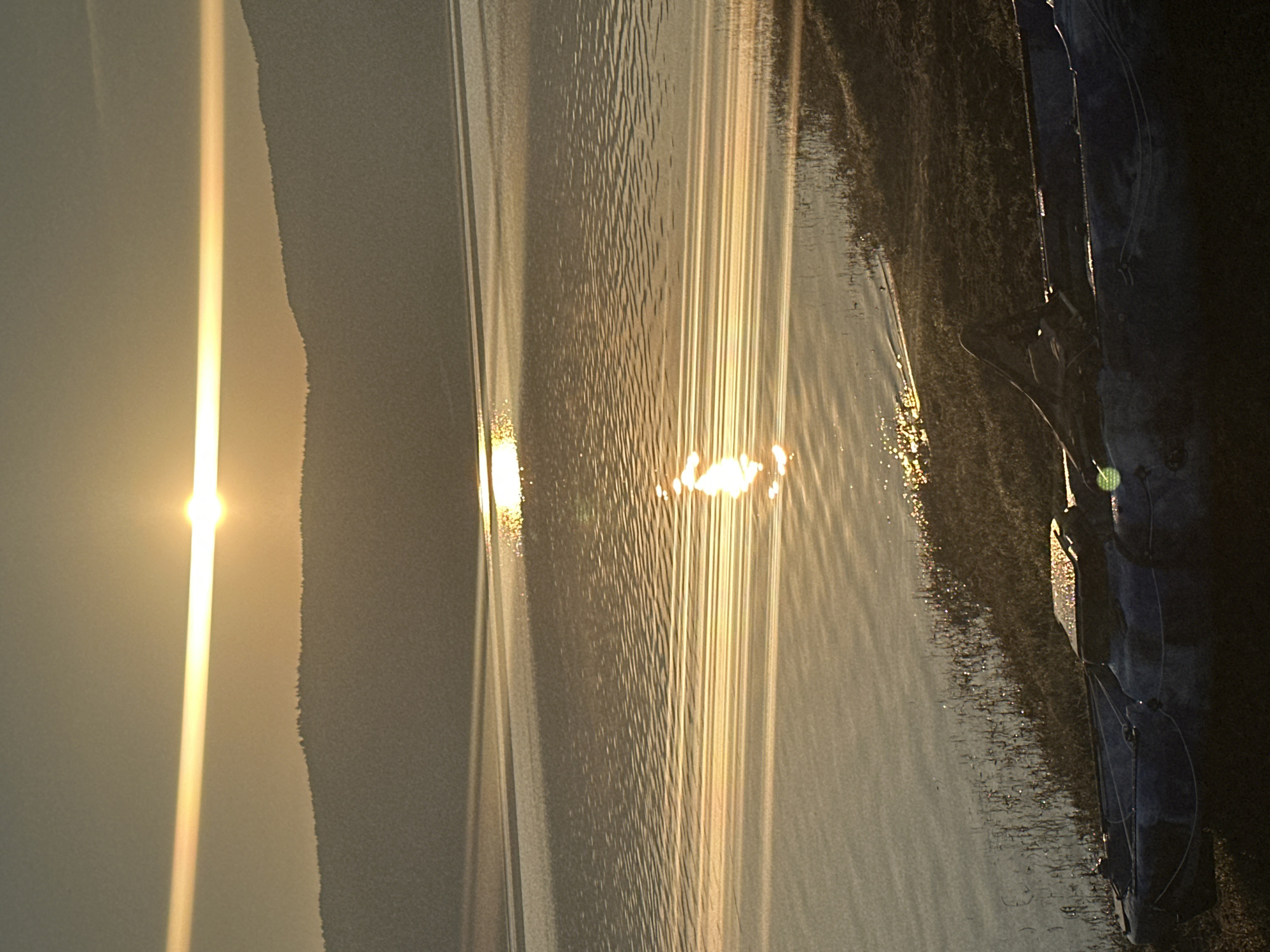 Sunrise over a Bulgarian lake, two angles