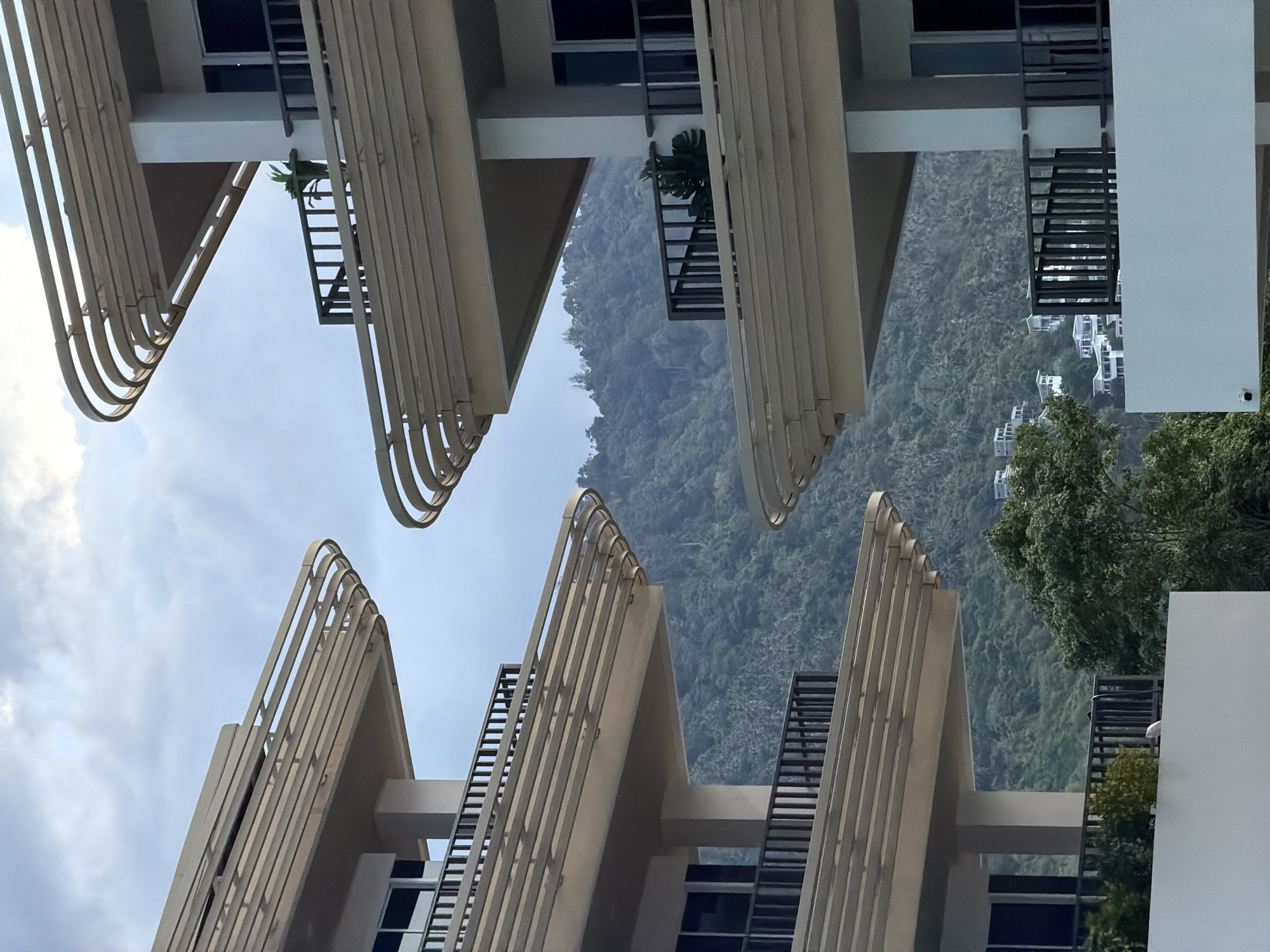 Modern apartment complex meets Ko Samui's lush hillside