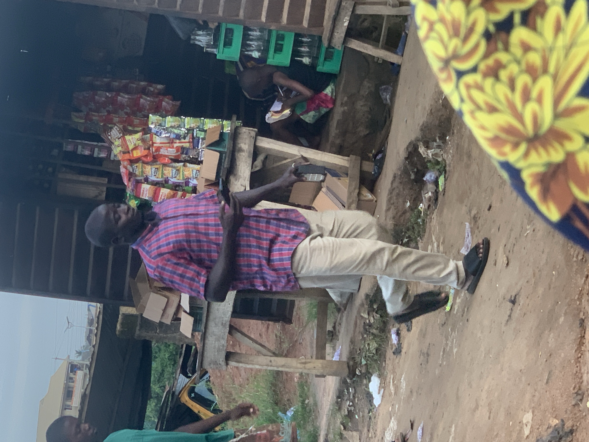 Everyday street life in Shagamu's dusty market quarter