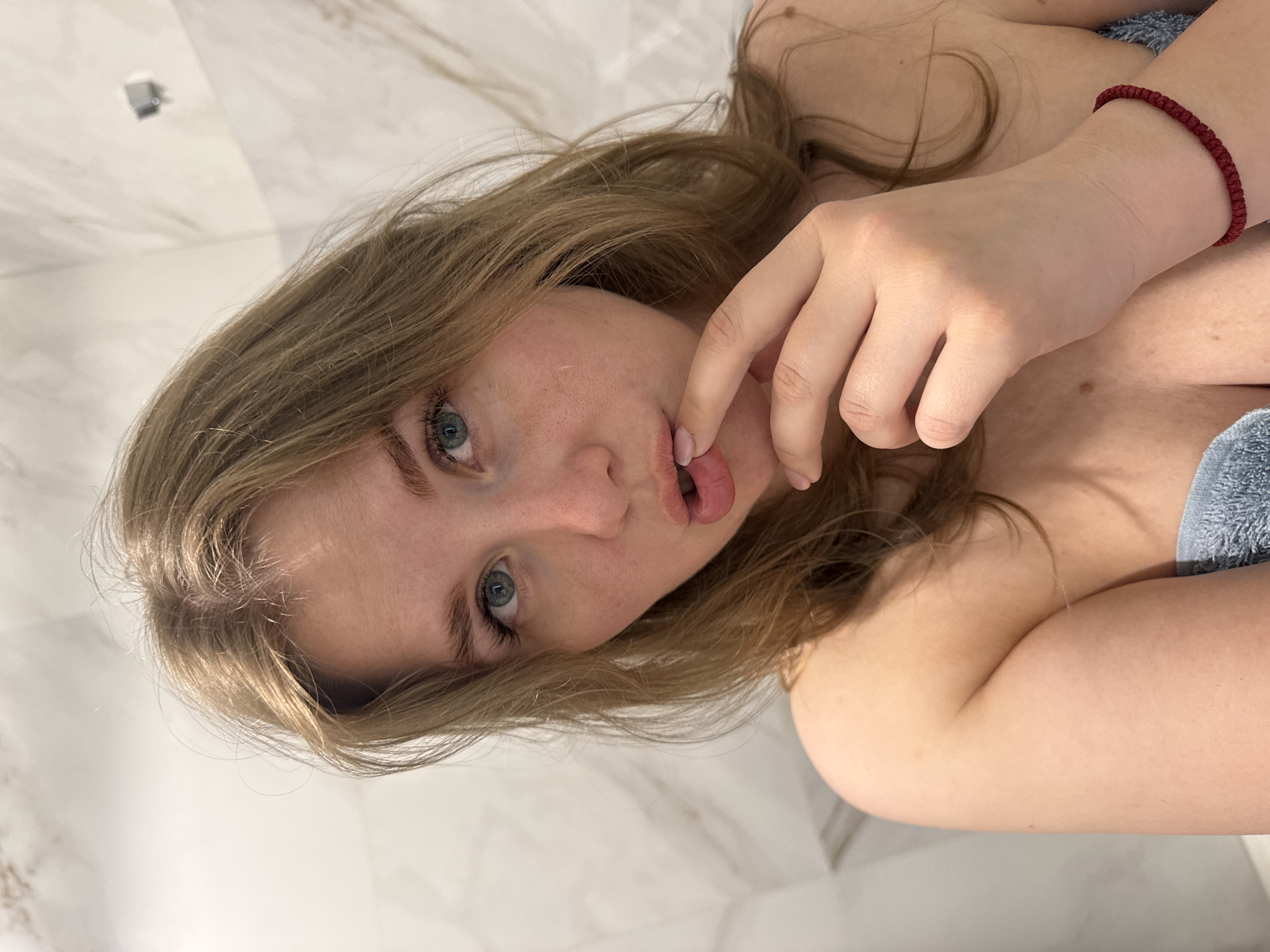 Woman takes bathroom selfies in Ferma, Russia