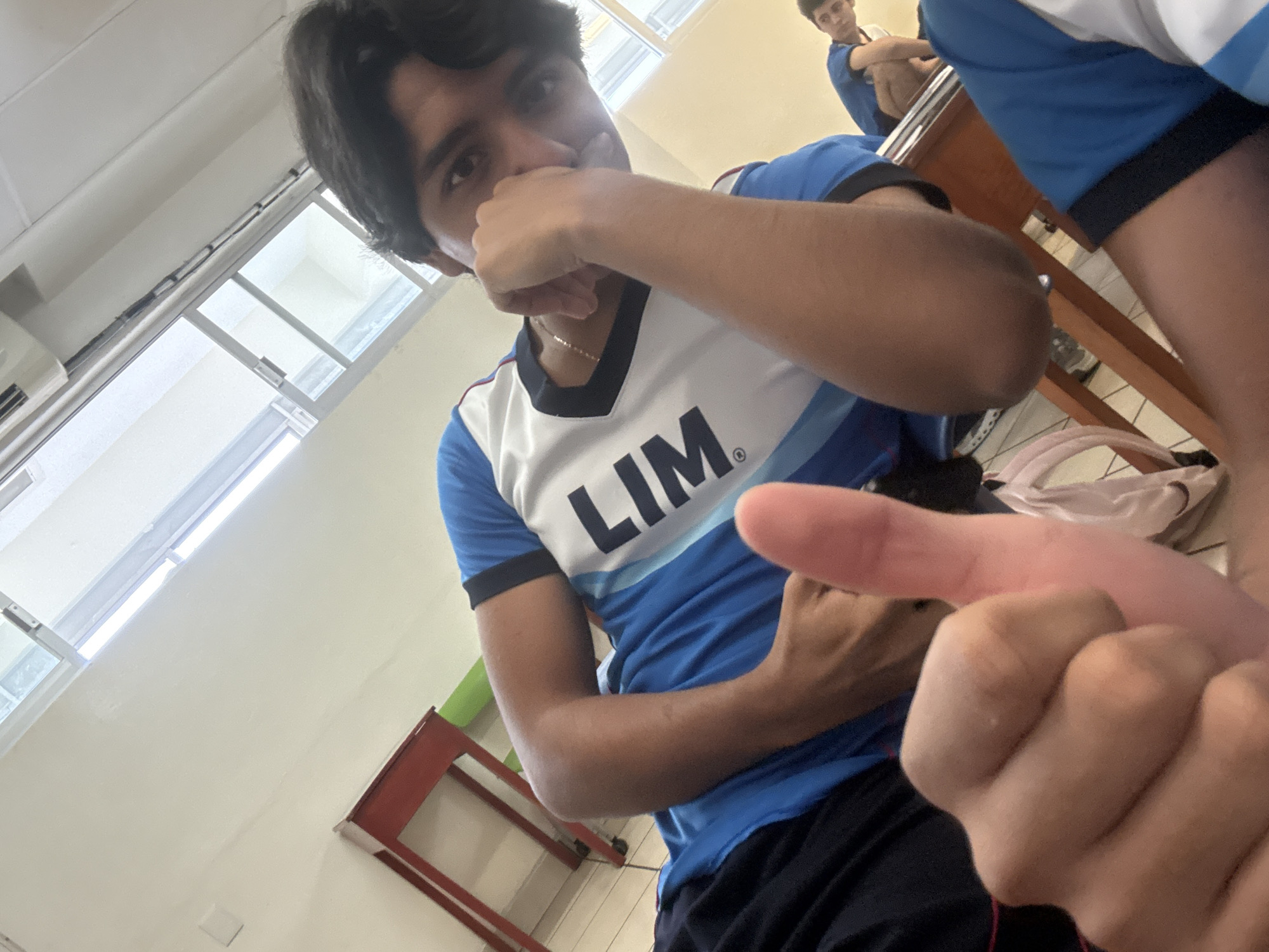 Young man photographed in Acapulco classroom setting