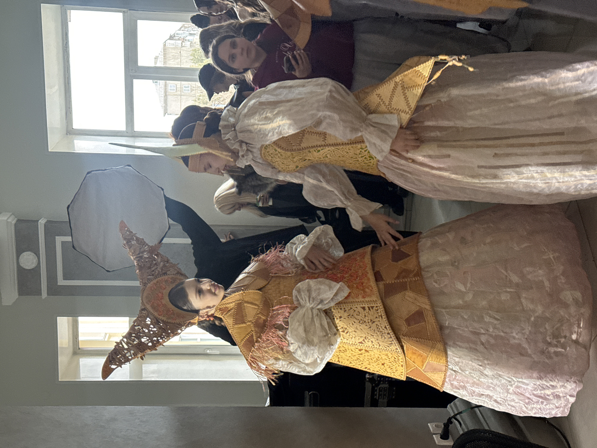 Costume event with traditional folk dress documented indoors