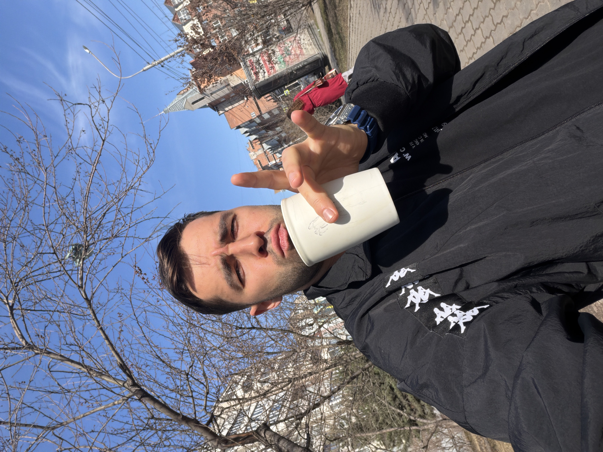 Man takes selfie with drink in Krasnoyarsk