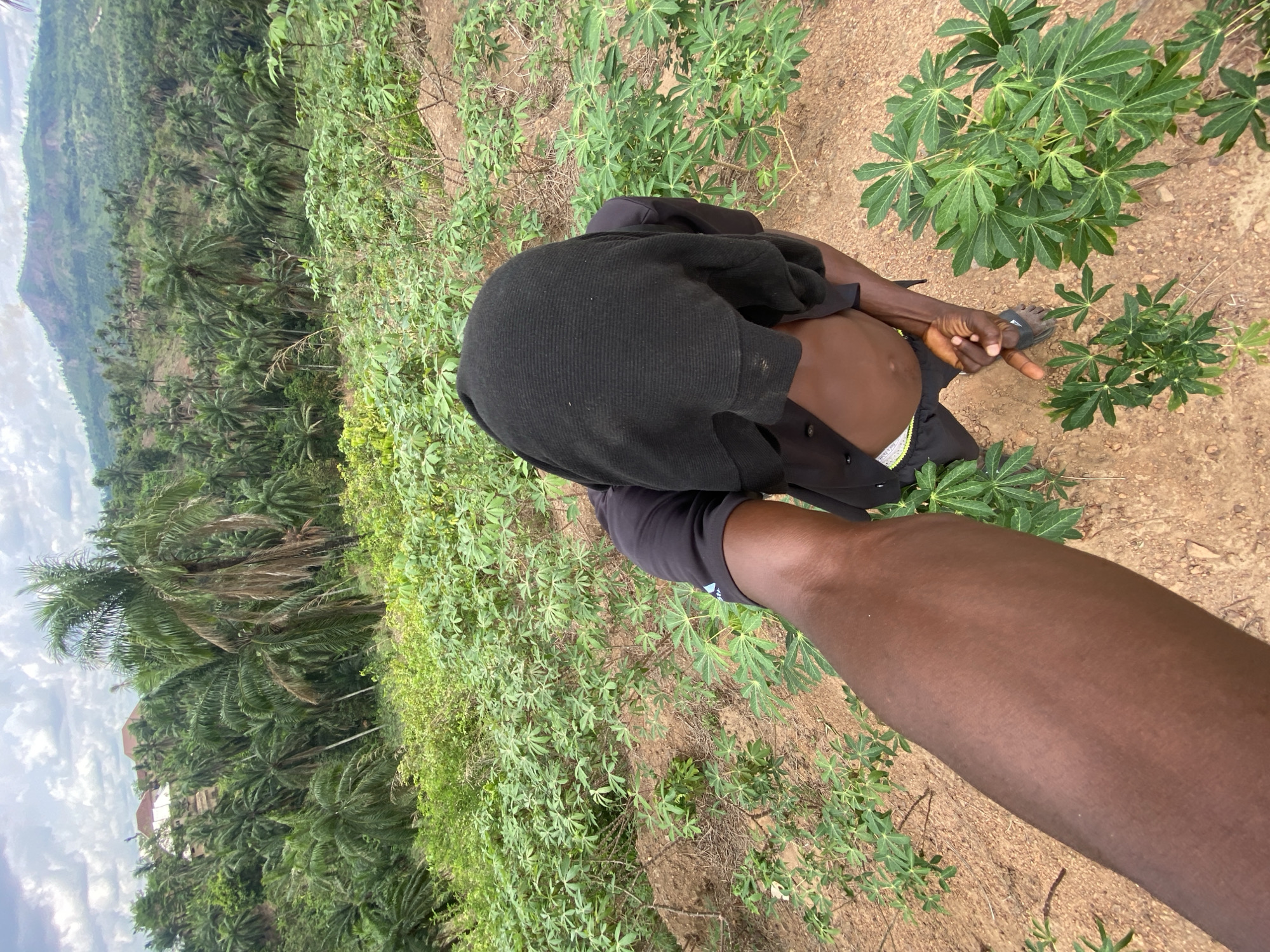 Man works cassava field, makes gestures in Achara Nigeria