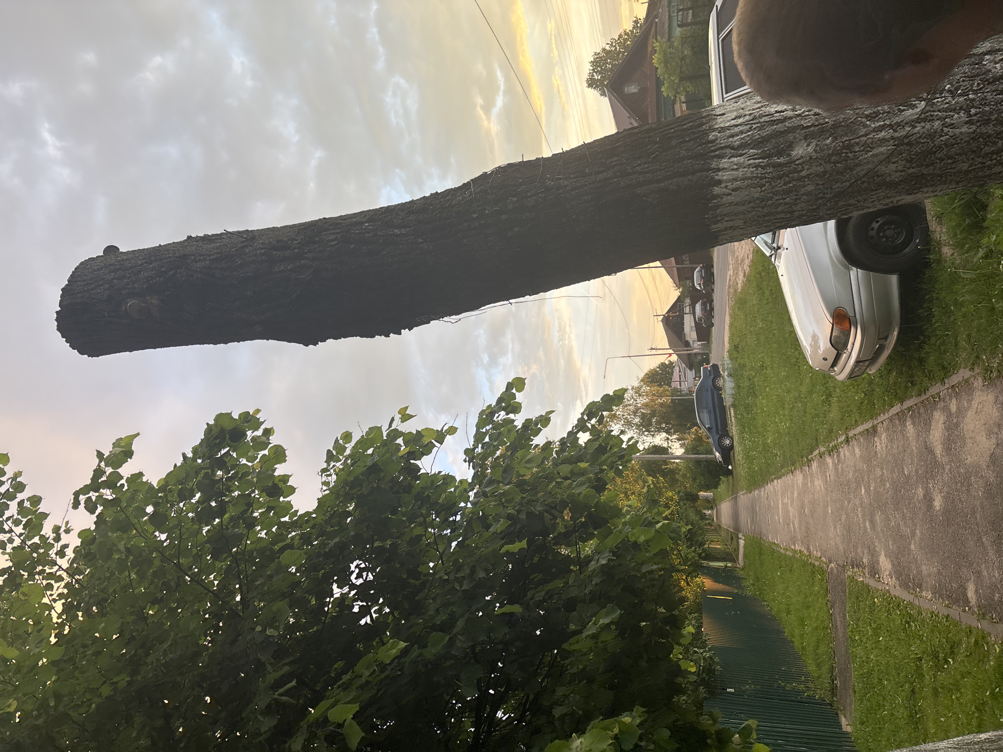 Evening walk documented through Russian village during dramatic sunset