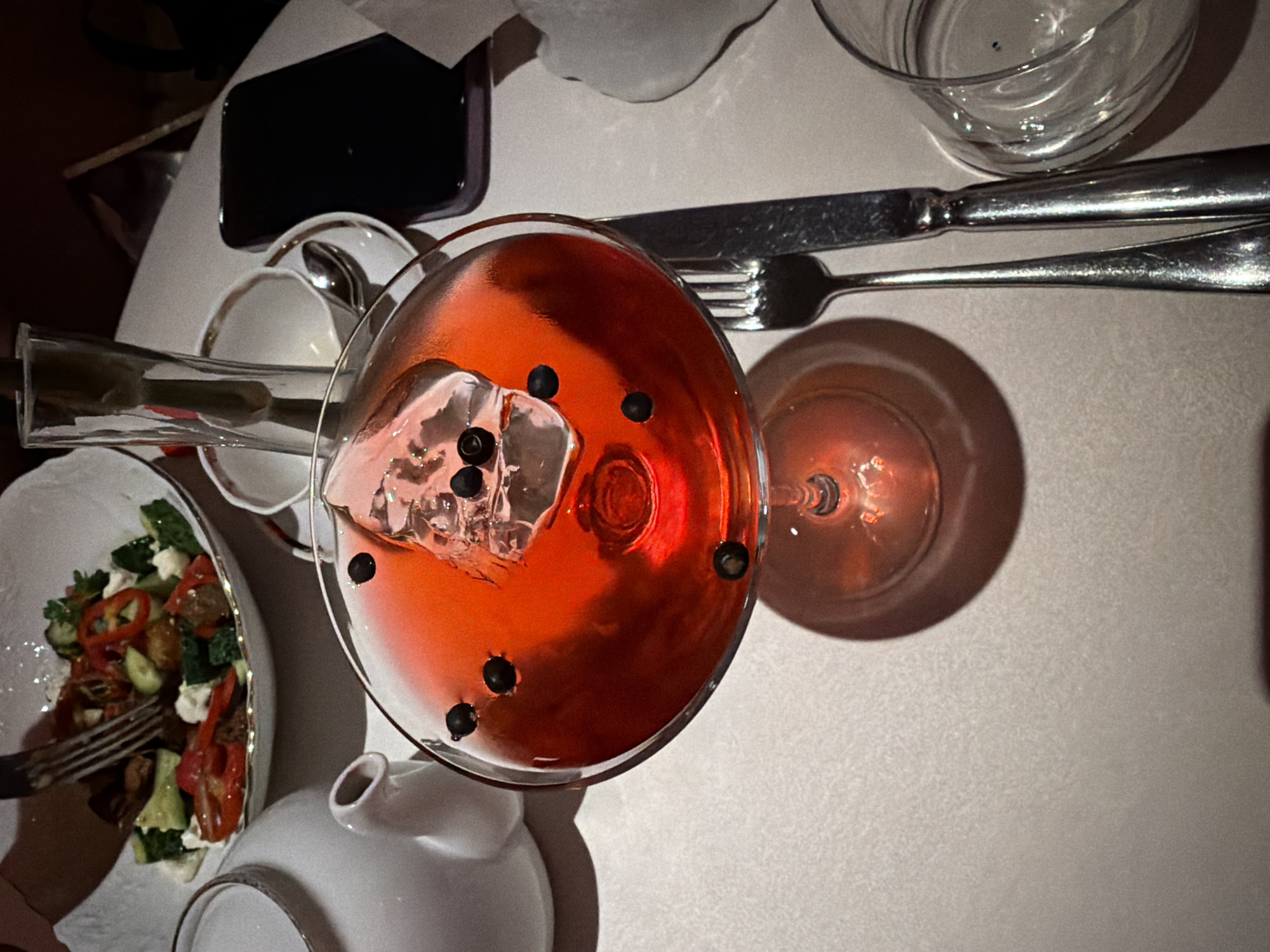 Moscow restaurant table setting documented during evening dining