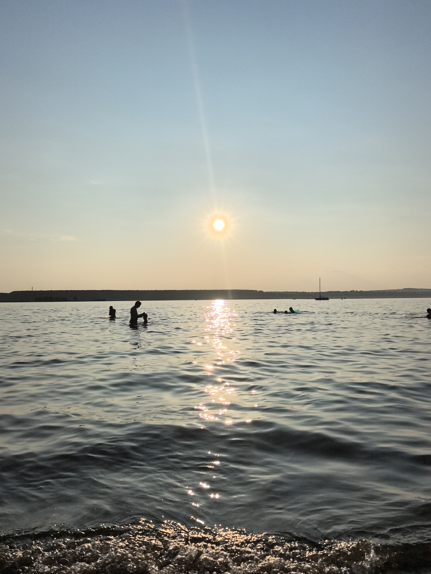 Paddleboarding on a sun-drenched river outside Perm