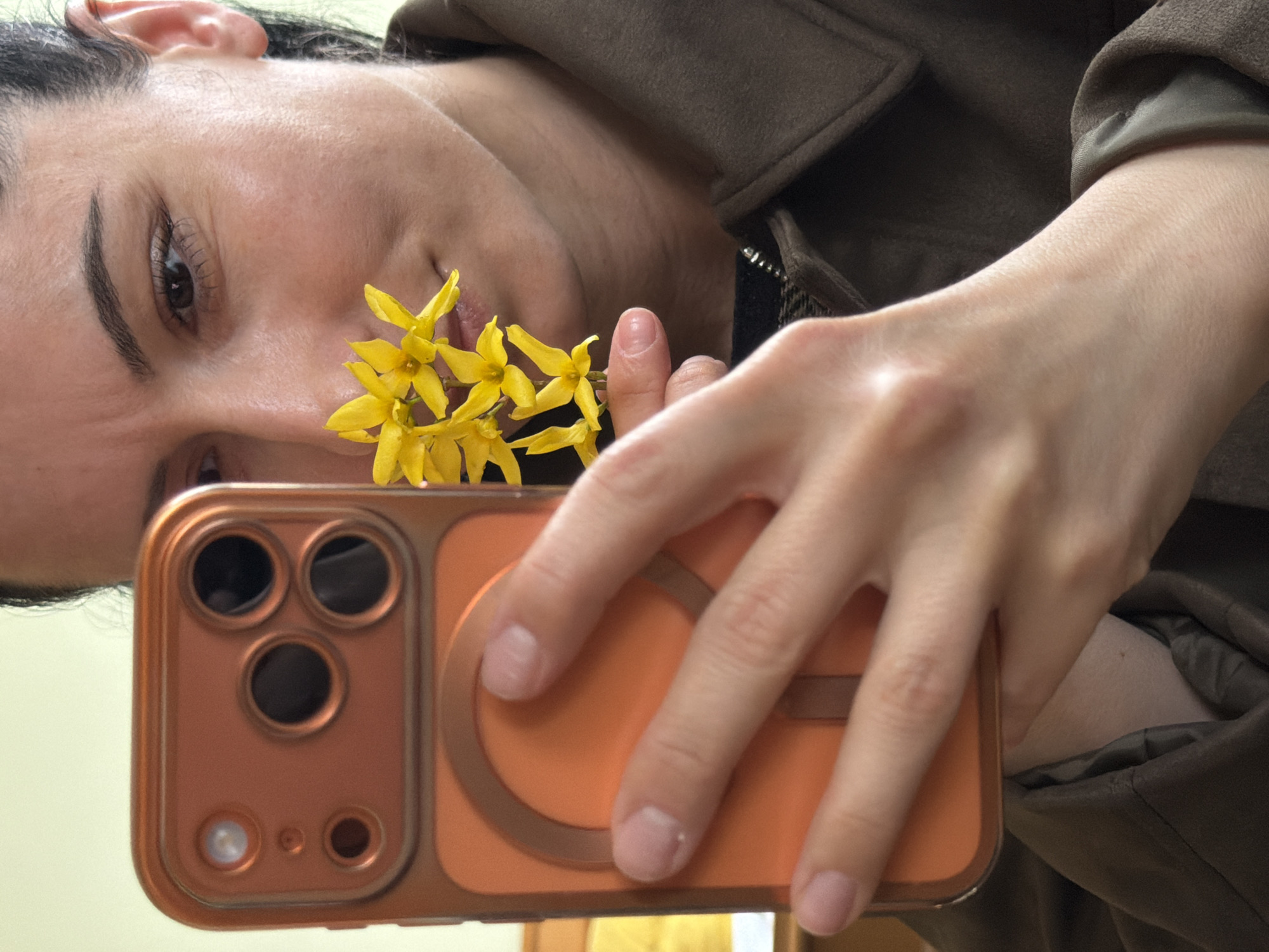 Spring flower moments captured with woman and cat in Pleven