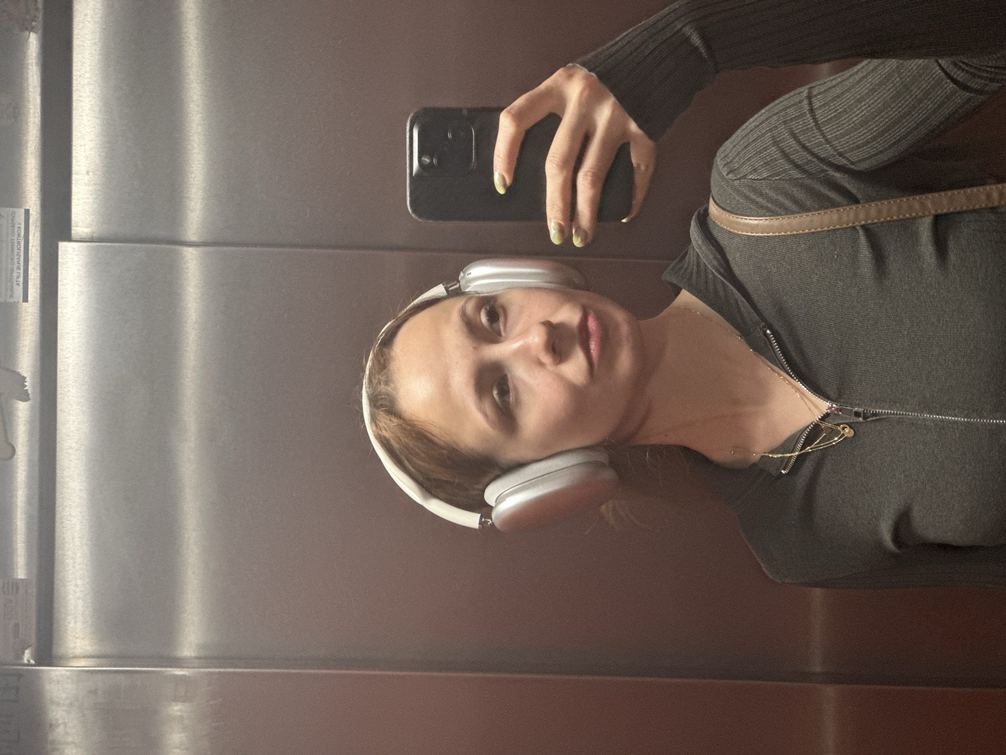 Woman takes elevator selfie in Novi Sad