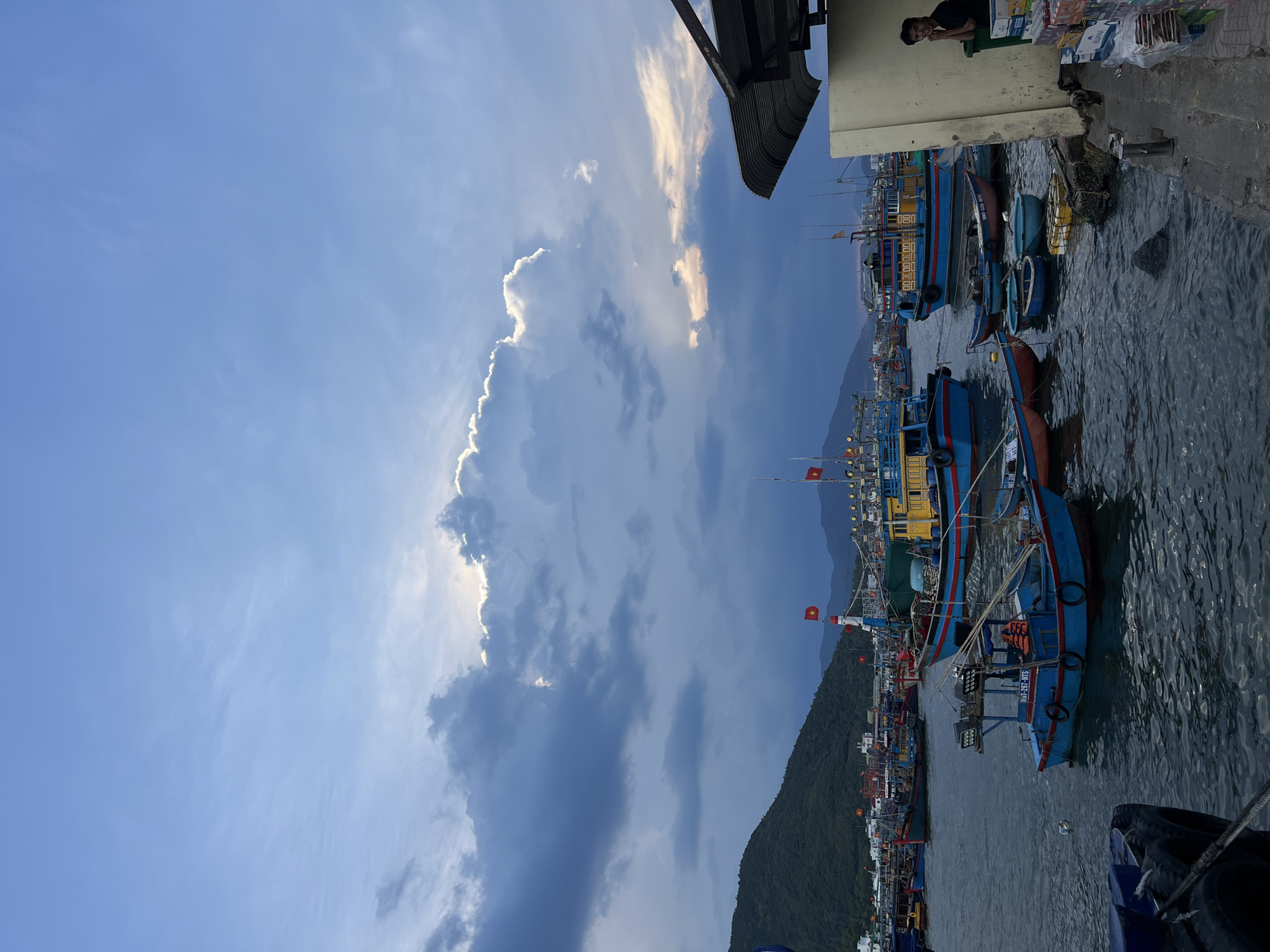 Fishing boats docked at pier in Nam Nha Trang Ward