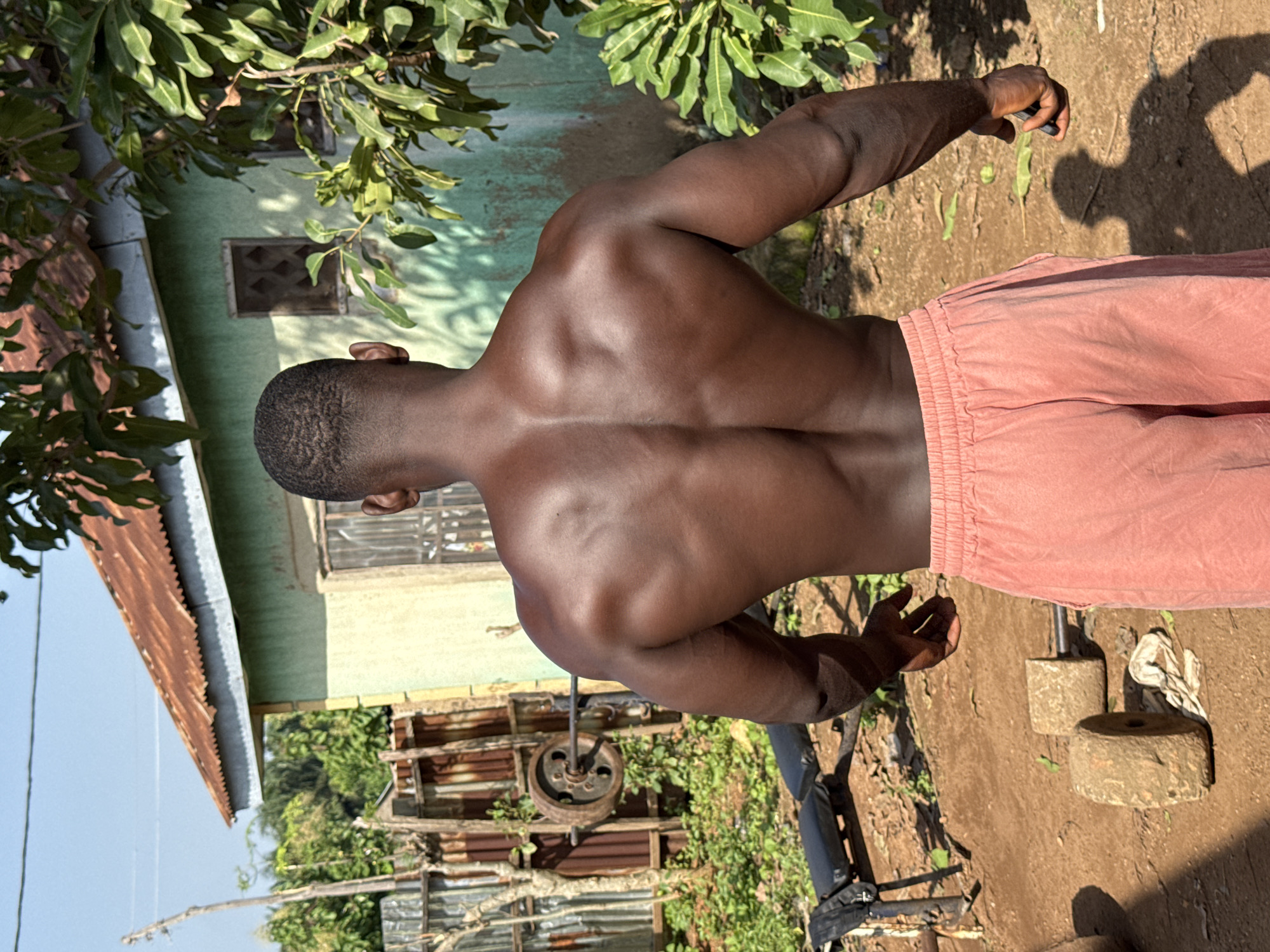 Makeshift outdoor gym session in Akwanga, Nigeria