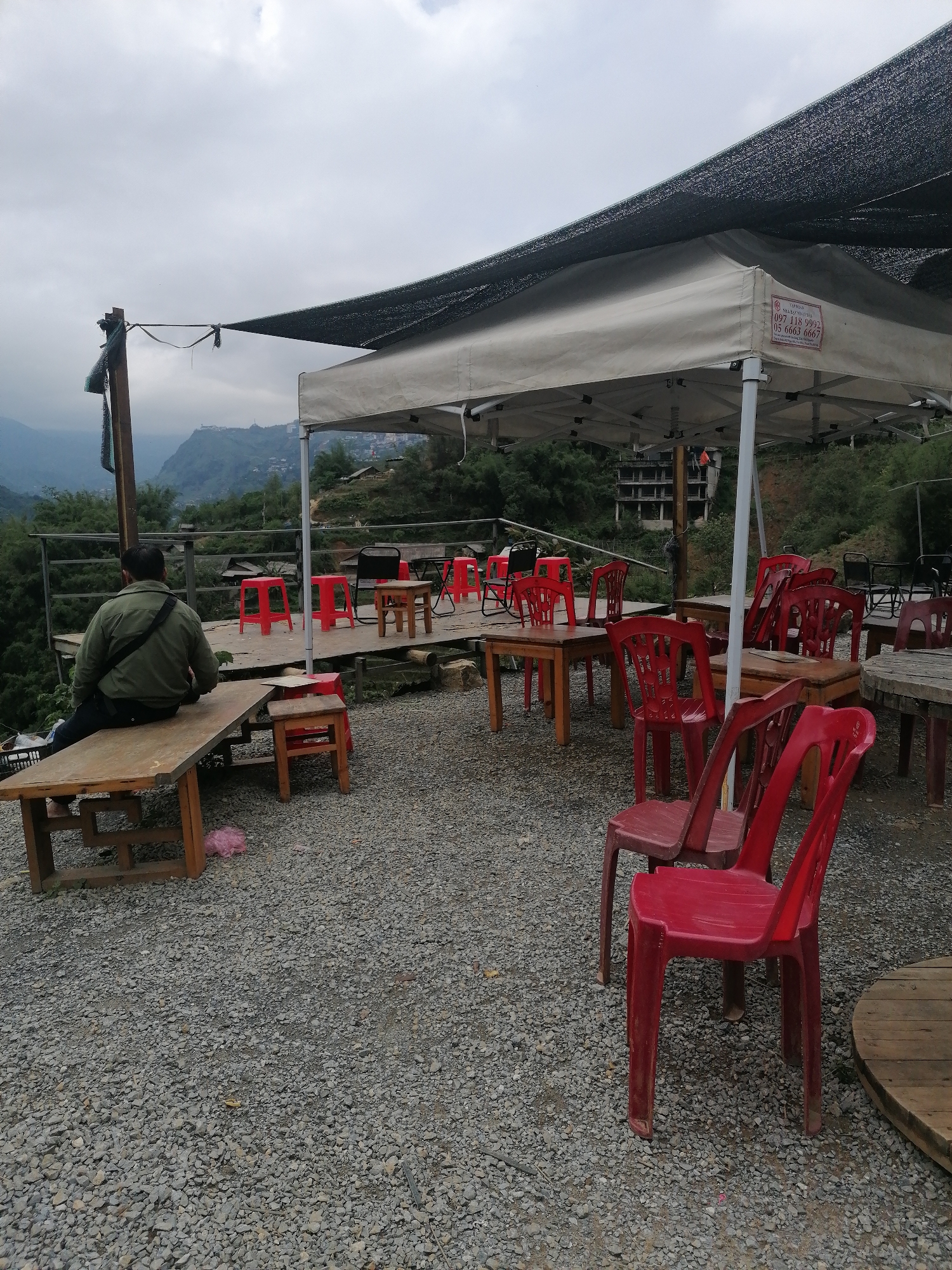 Tourist visits Cat Cat Village market and scenic overlook