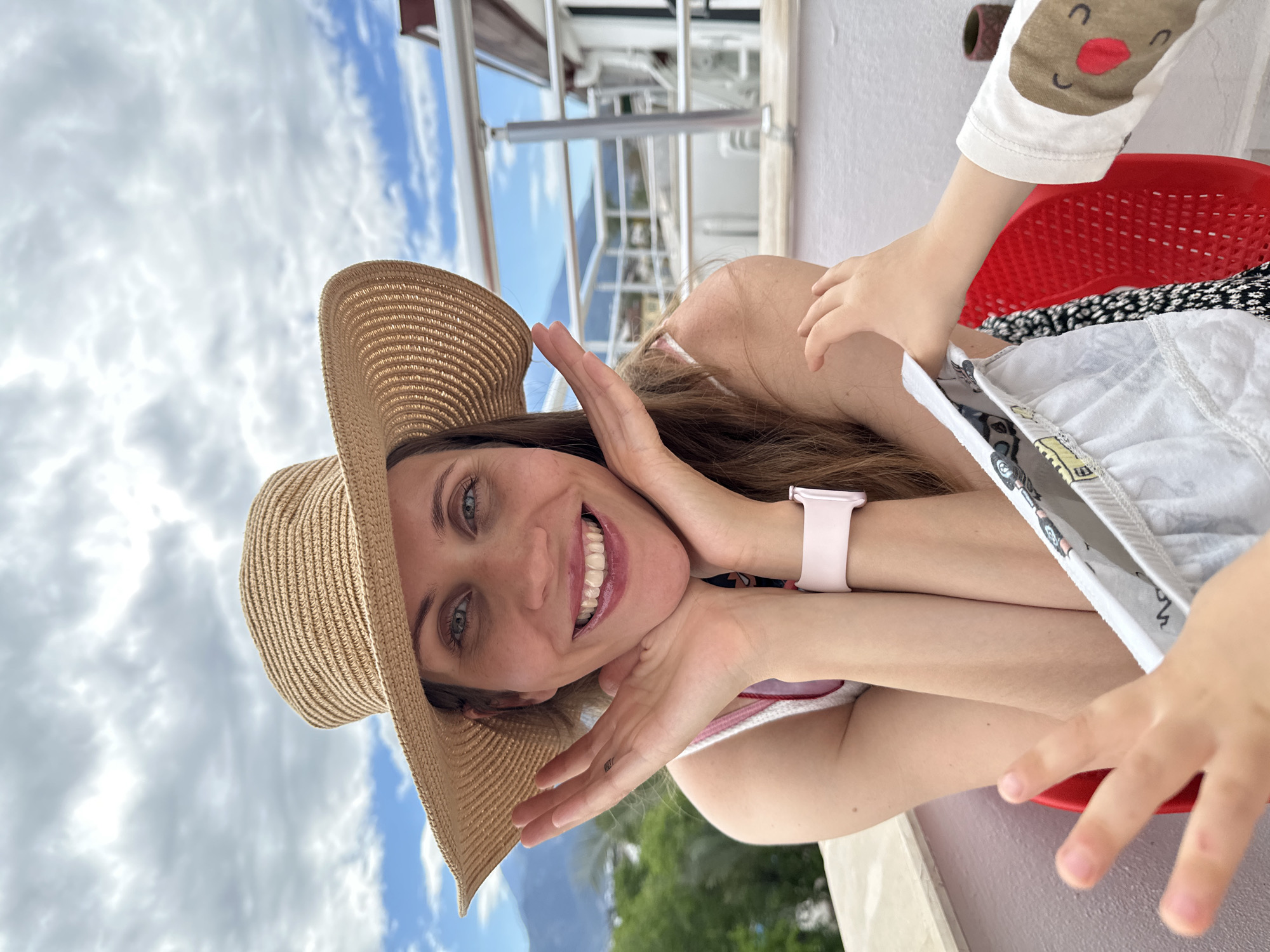 Family vacation selfies captured on Fethiye balcony overlooking mountains