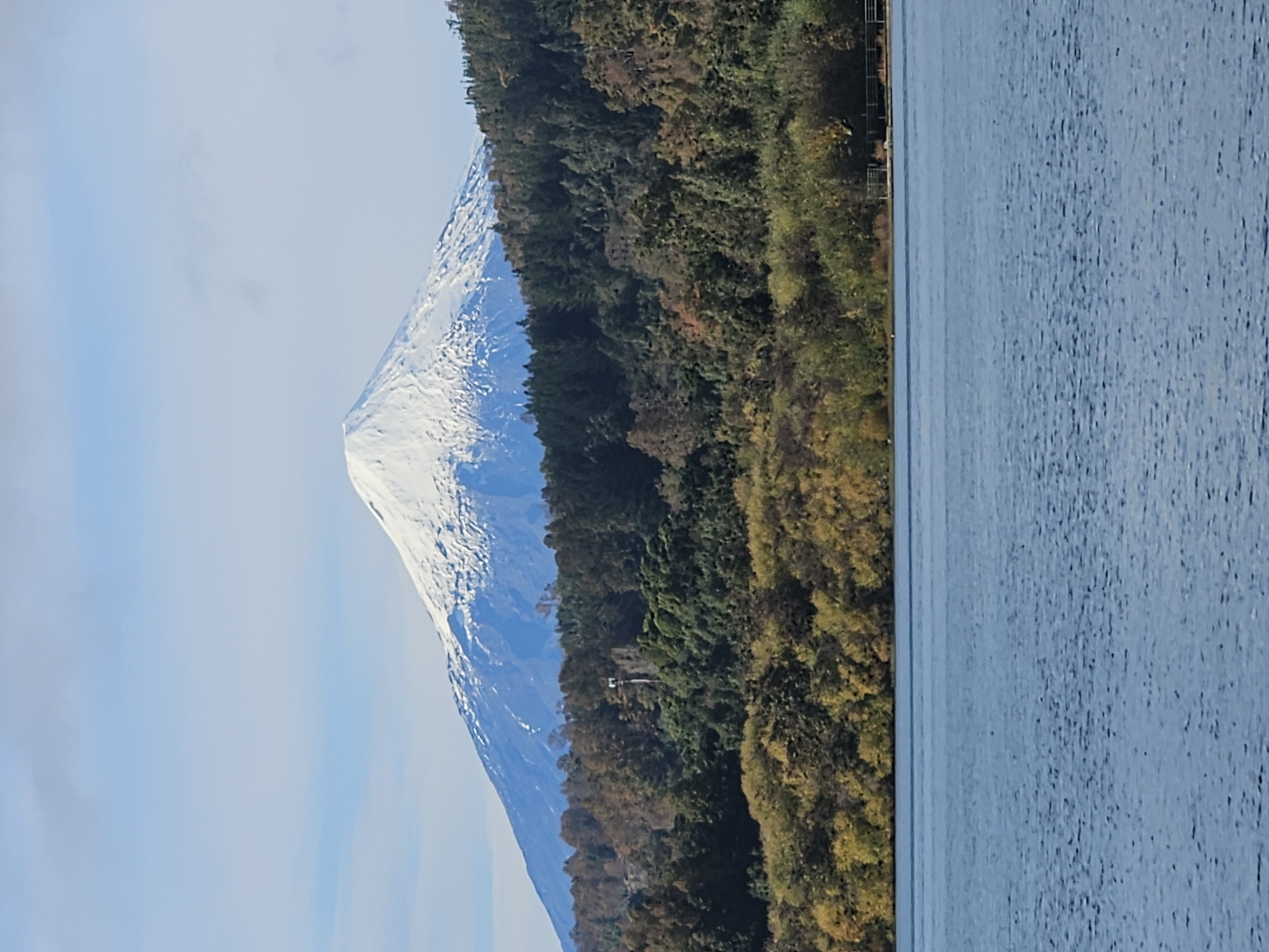 Daily life documented along Villarrica lakefront with volcano views