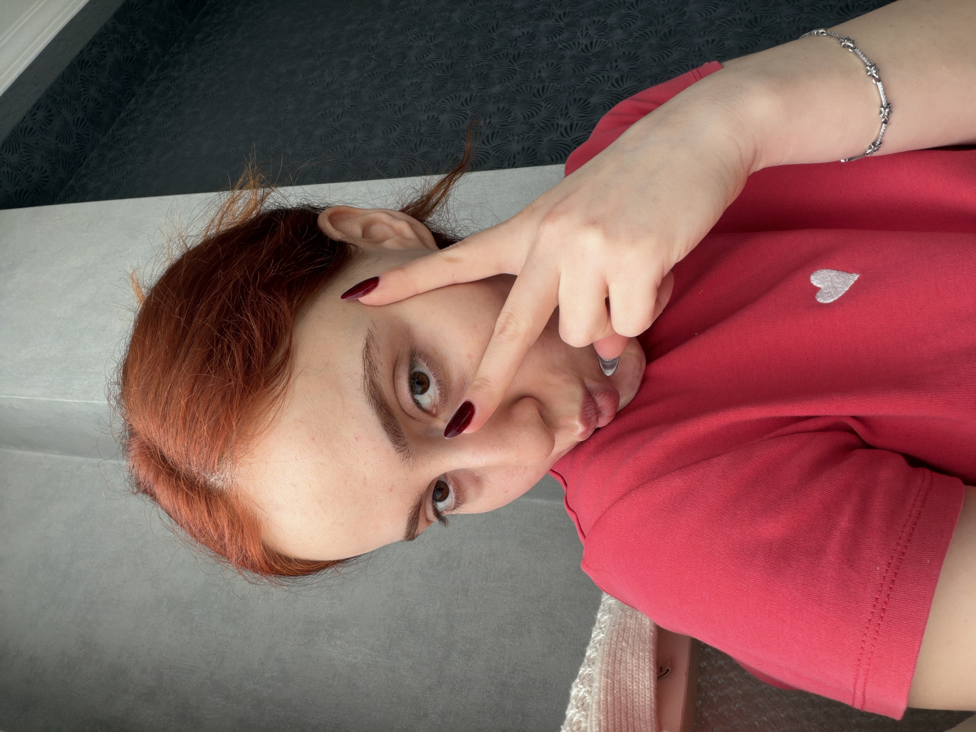 Woman takes selfies in Tbilisi apartment morning session