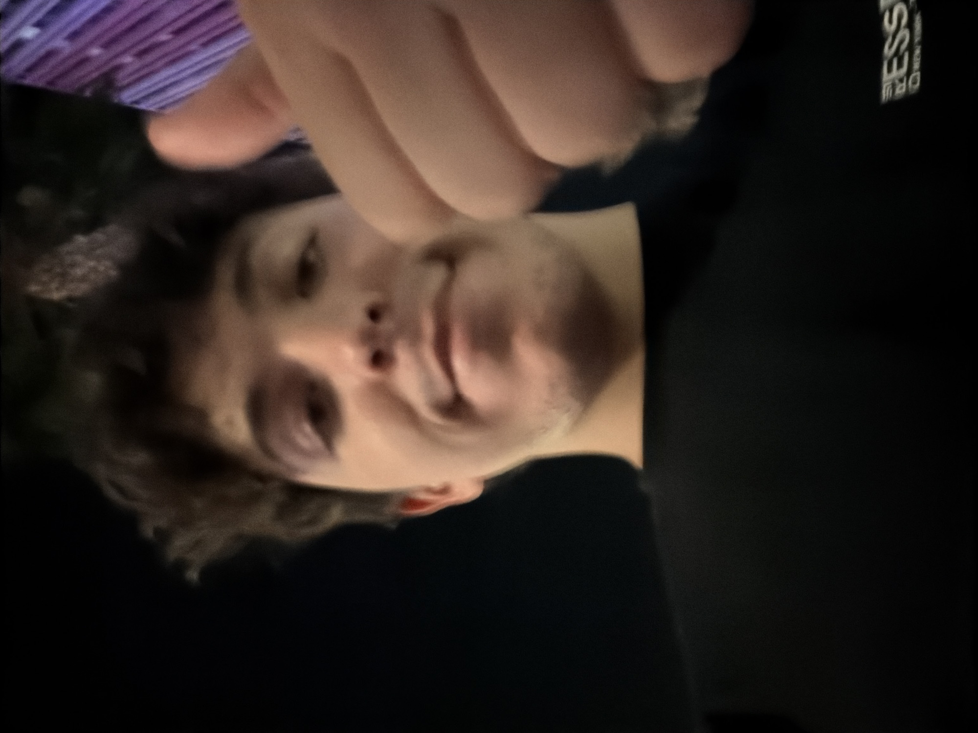 Young man takes indoor selfie in Riverside