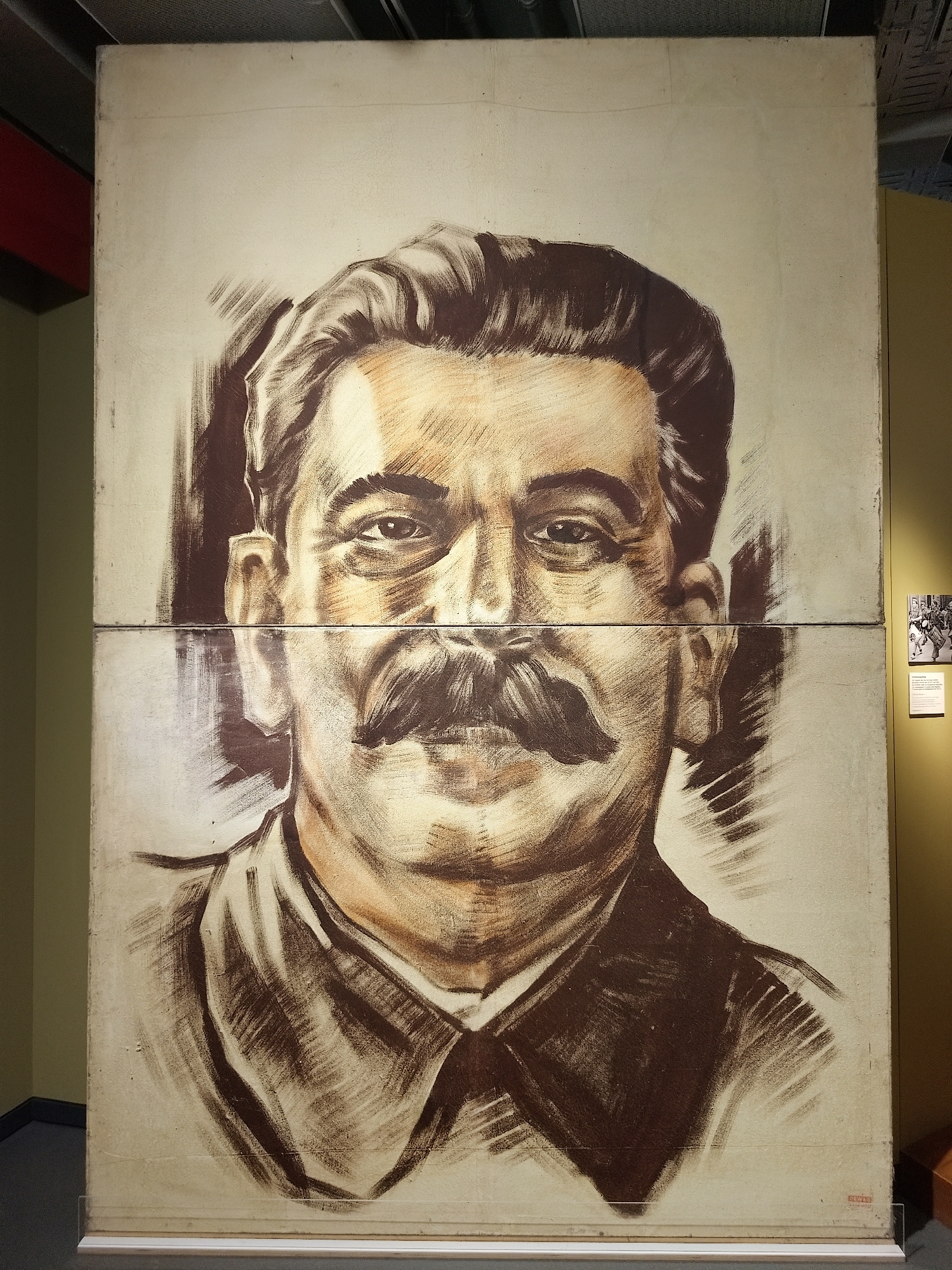 Visitor documents extensive East German museum exhibits and artifacts