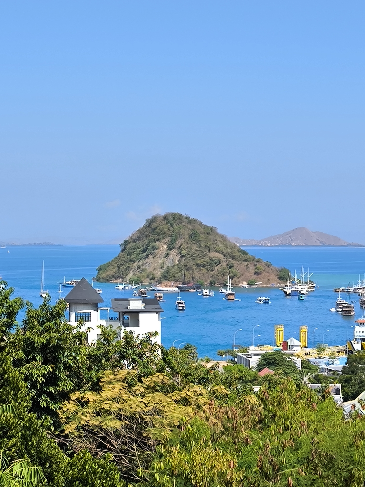 Labuan Bajo harbor and islands on a sunny day
