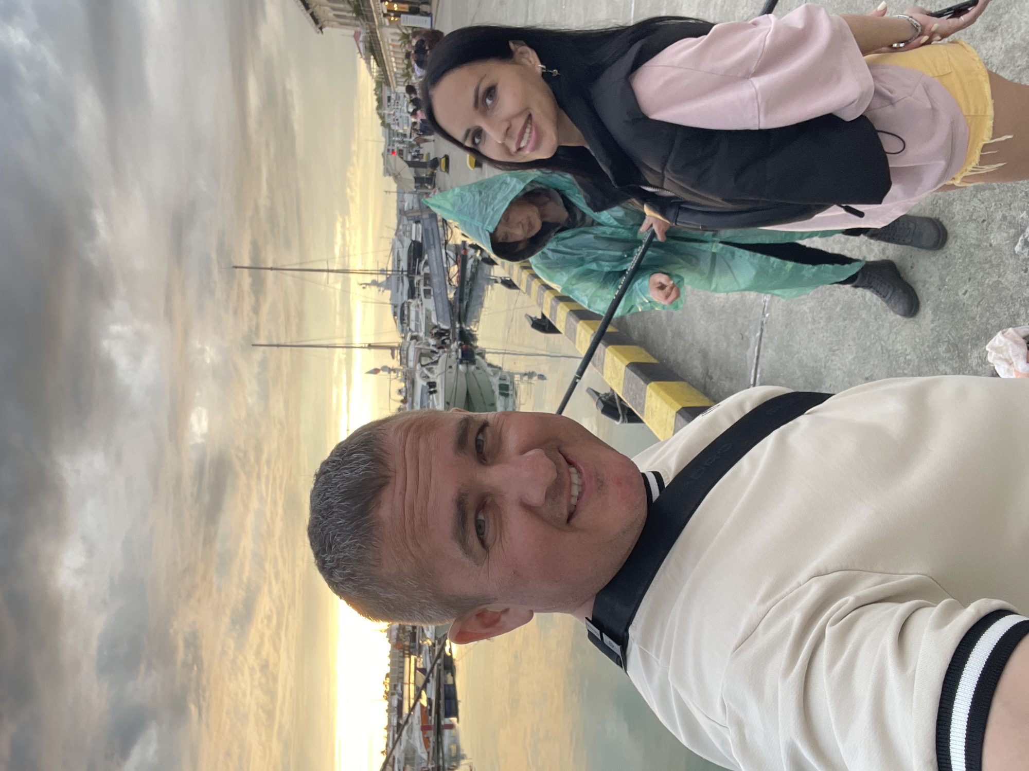 Tourists enjoy typical afternoon activities at Sochi marina district