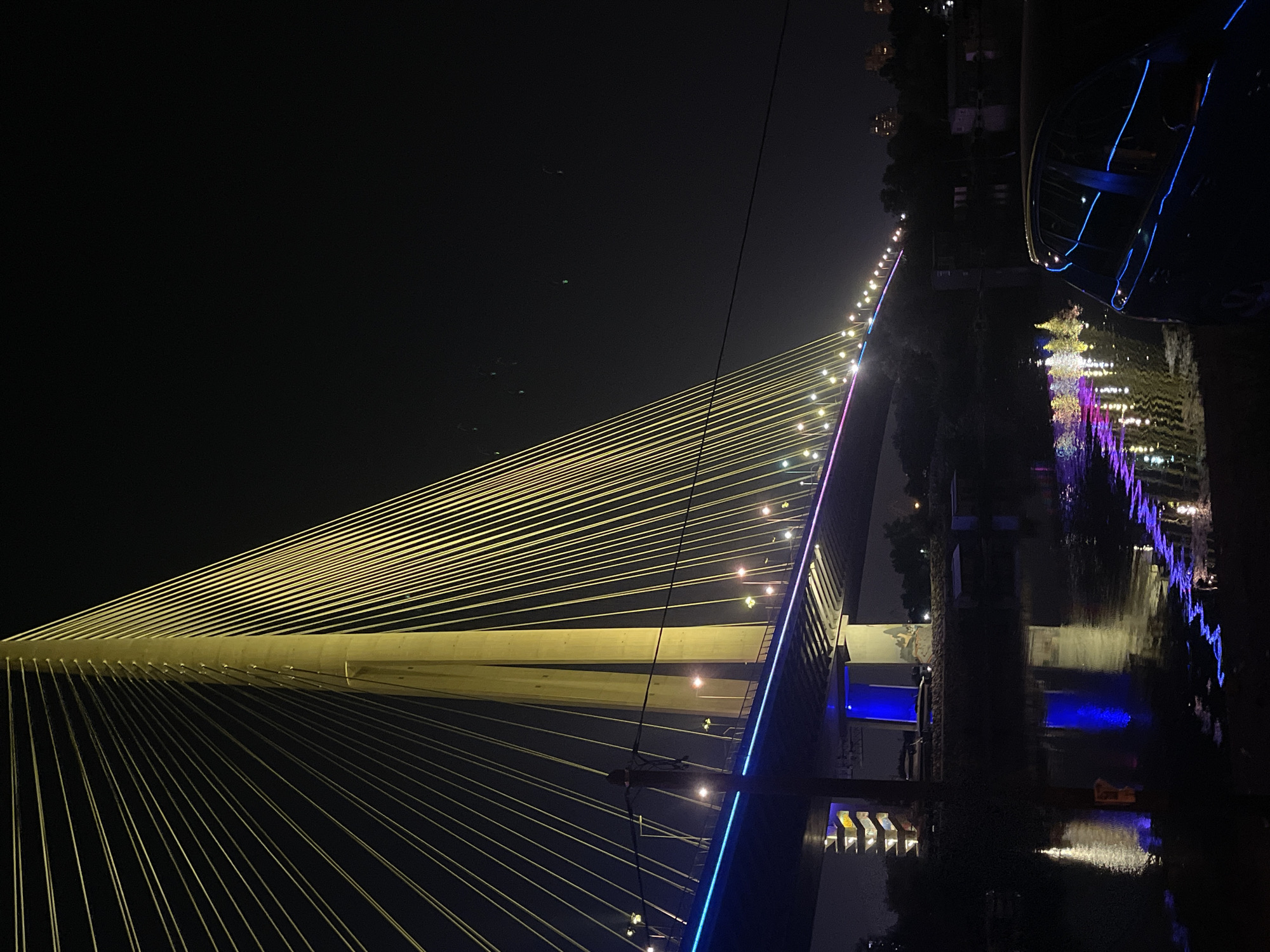 Ada Bridge pylon glowing at night, Belgrade