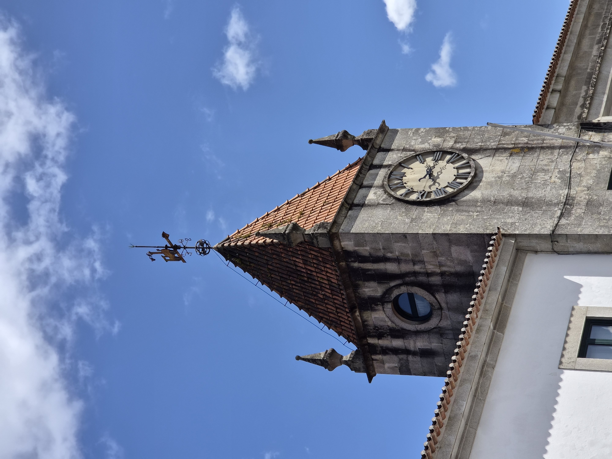 Afternoon scenes captured in Barcelos, Portugal featuring clock tower