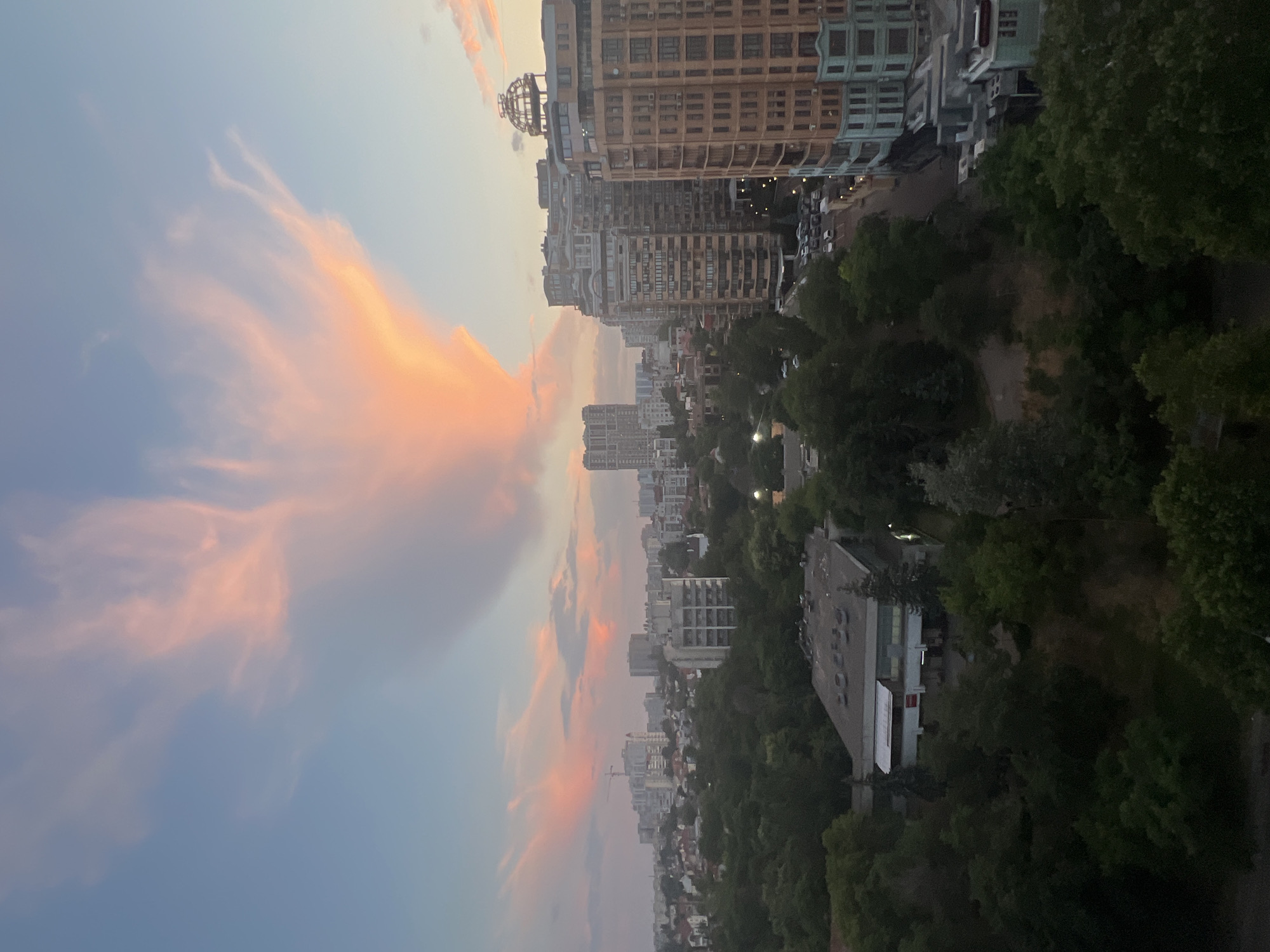 Sunset clouds glow over Odesa at dusk