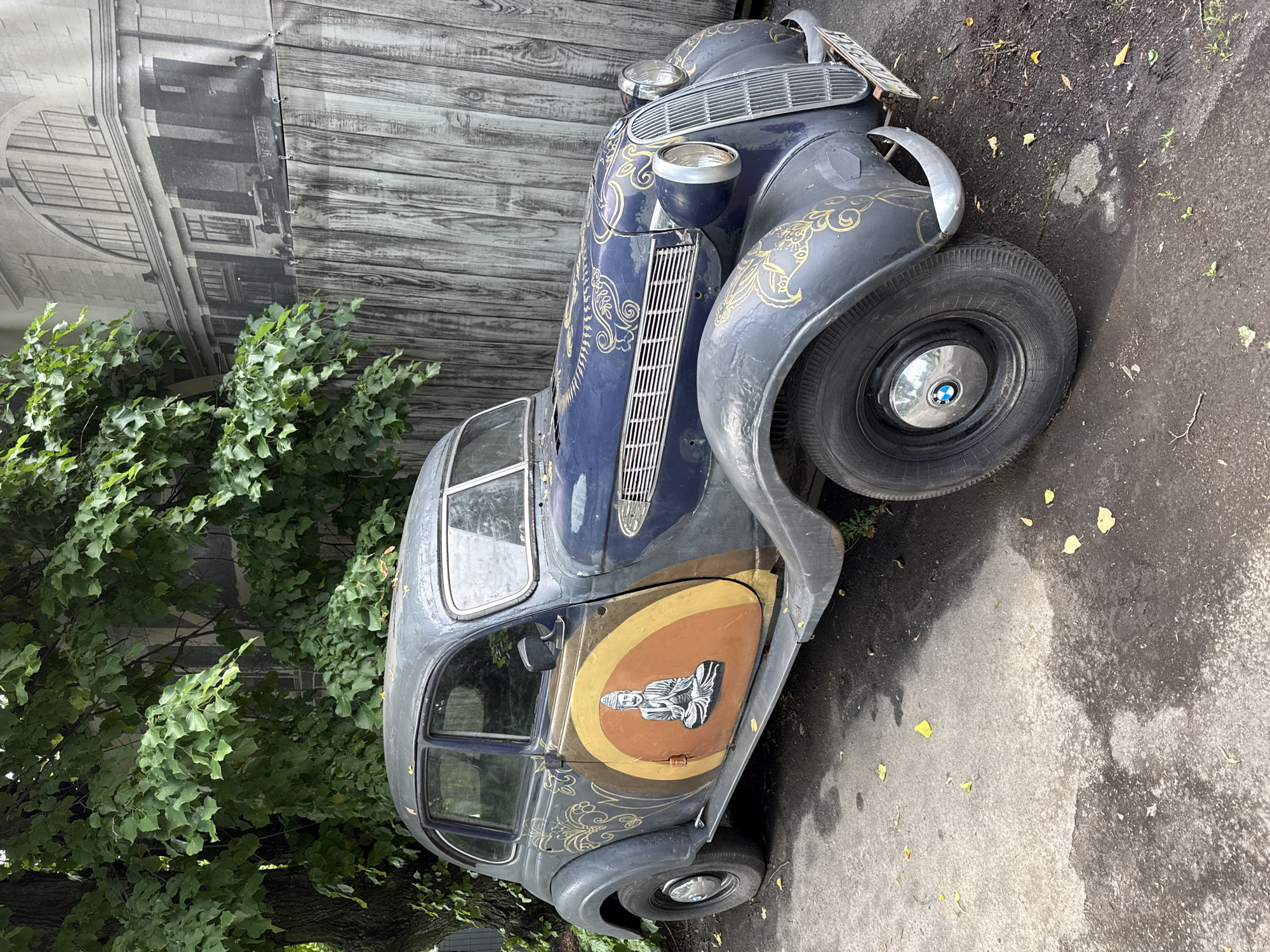 Vintage car show documented in Vinnytsia park with decorated vehicles