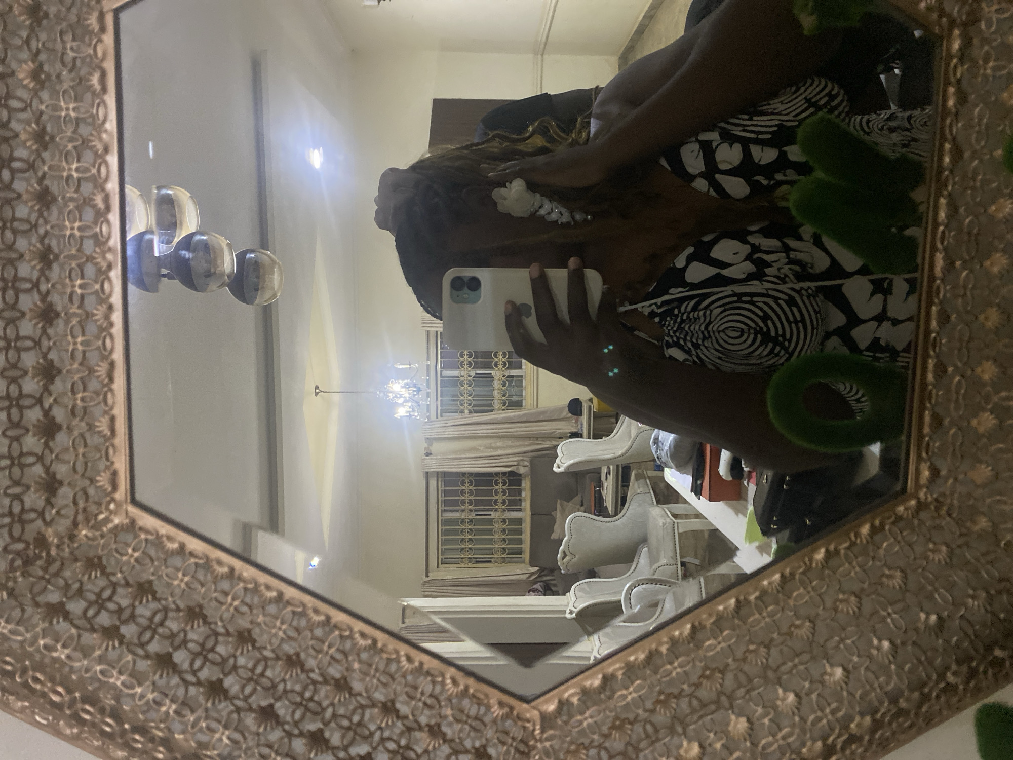 Evening plant care and casual moments in Nigerian home