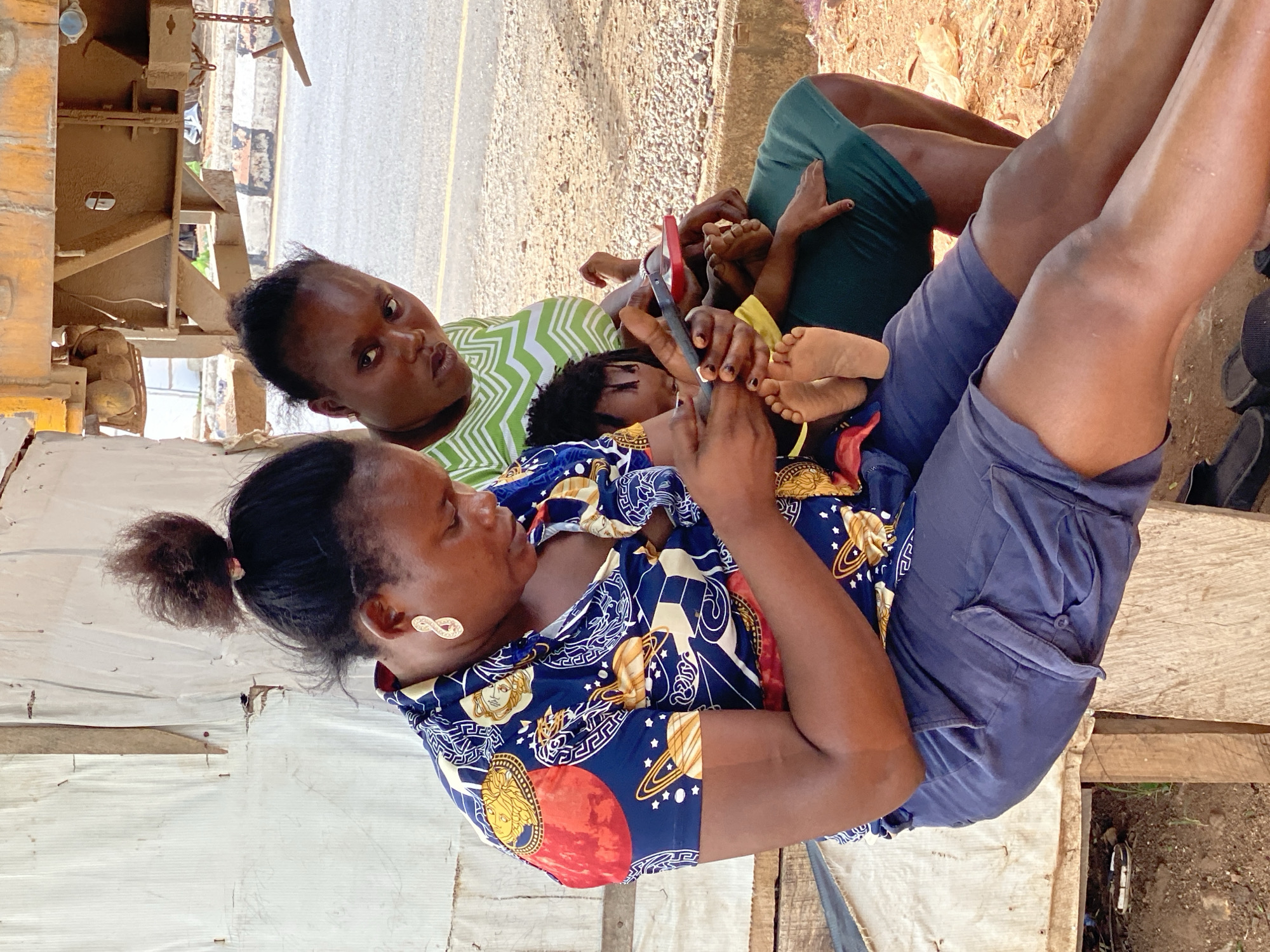 Family moment captured outdoors in Zango-ndaji, Nigeria