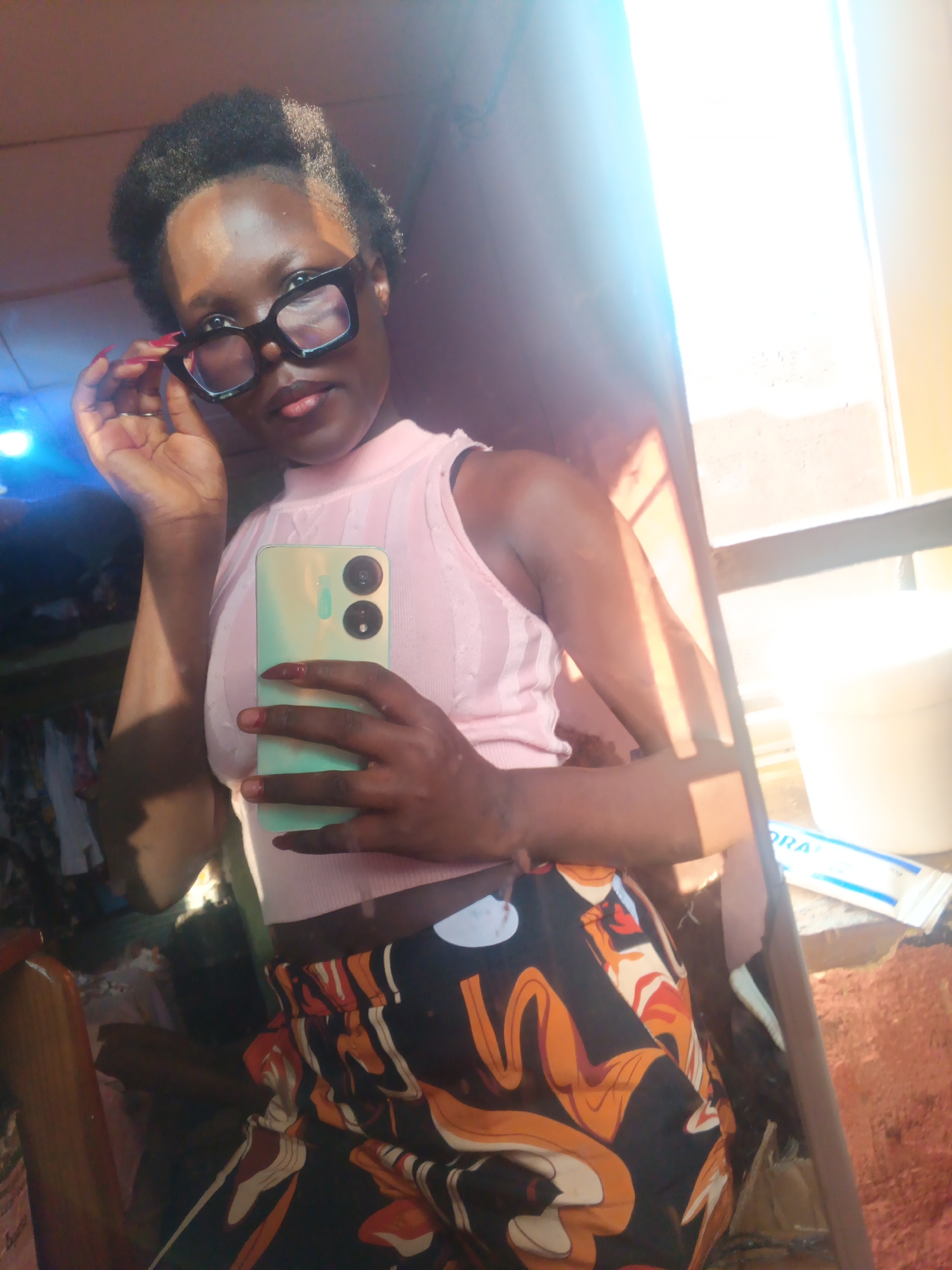 Selfie session at home in Onitsha, with a few casual hangout moments