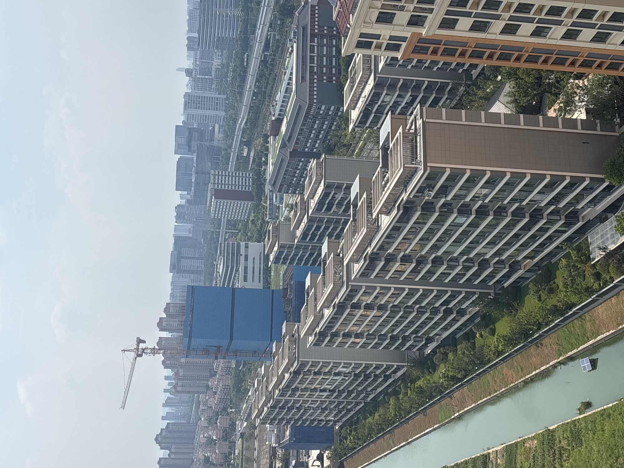 Suzhou Industrial Park residential streets and rooftops, August morning