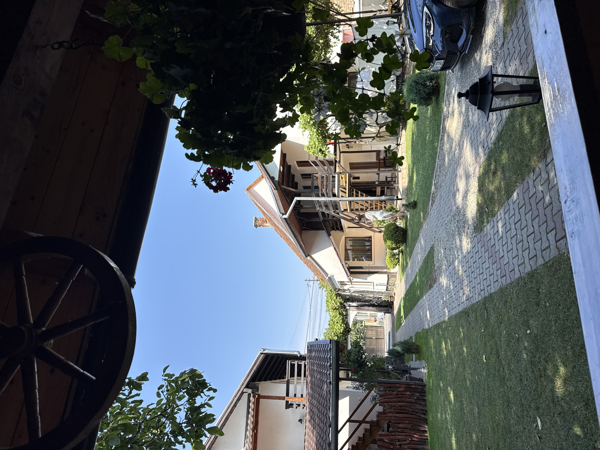Morning coffee break at a rustic Cârțișoara guesthouse patio