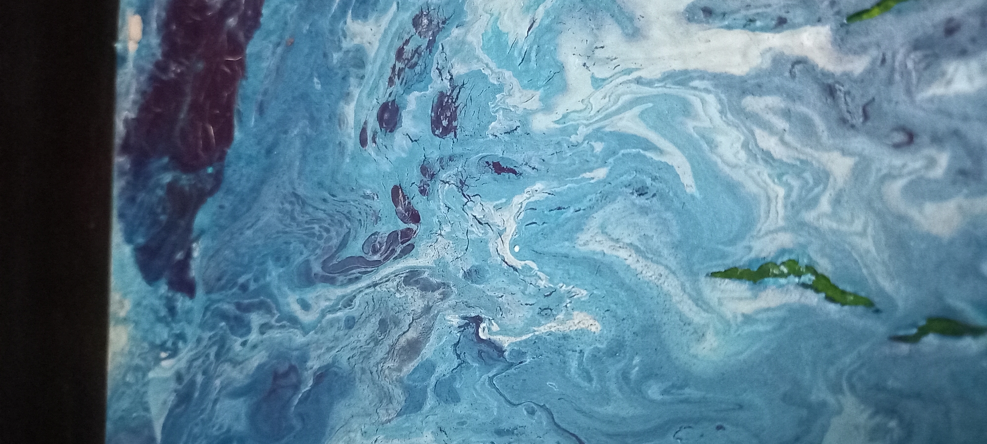 Artist documents paintings and objects in Ukrainian studio session