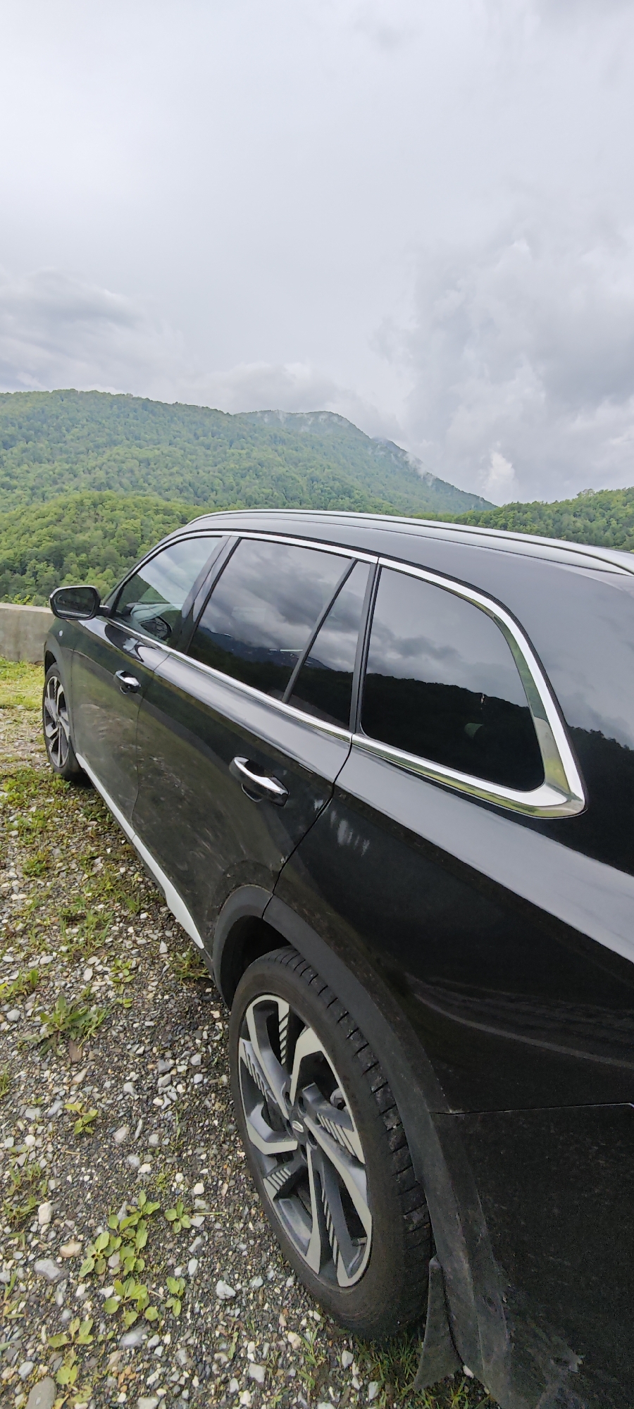 Black SUV parked in mountainous Estosadok, Russia