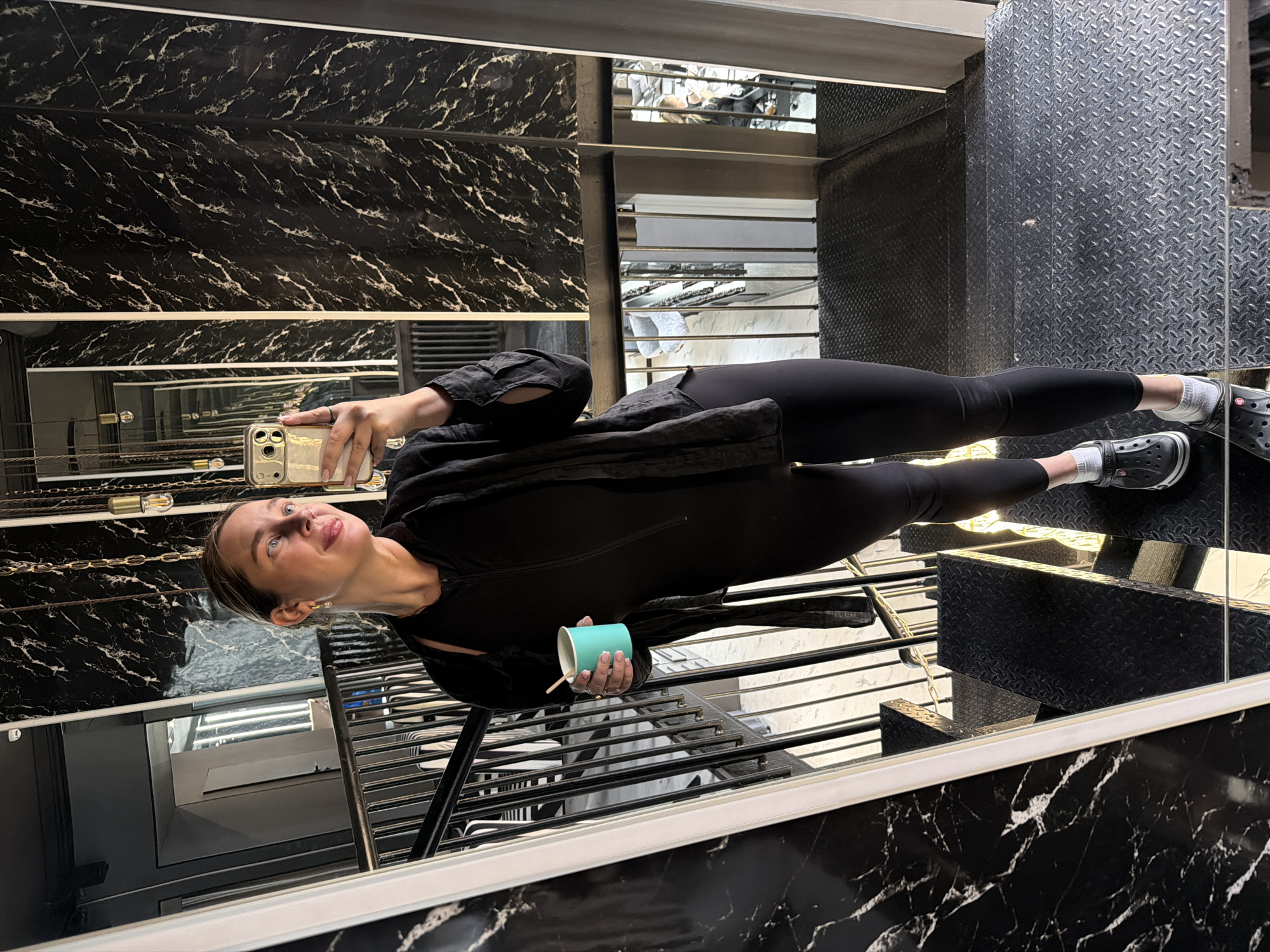 Person takes selfies in Moscow building interior