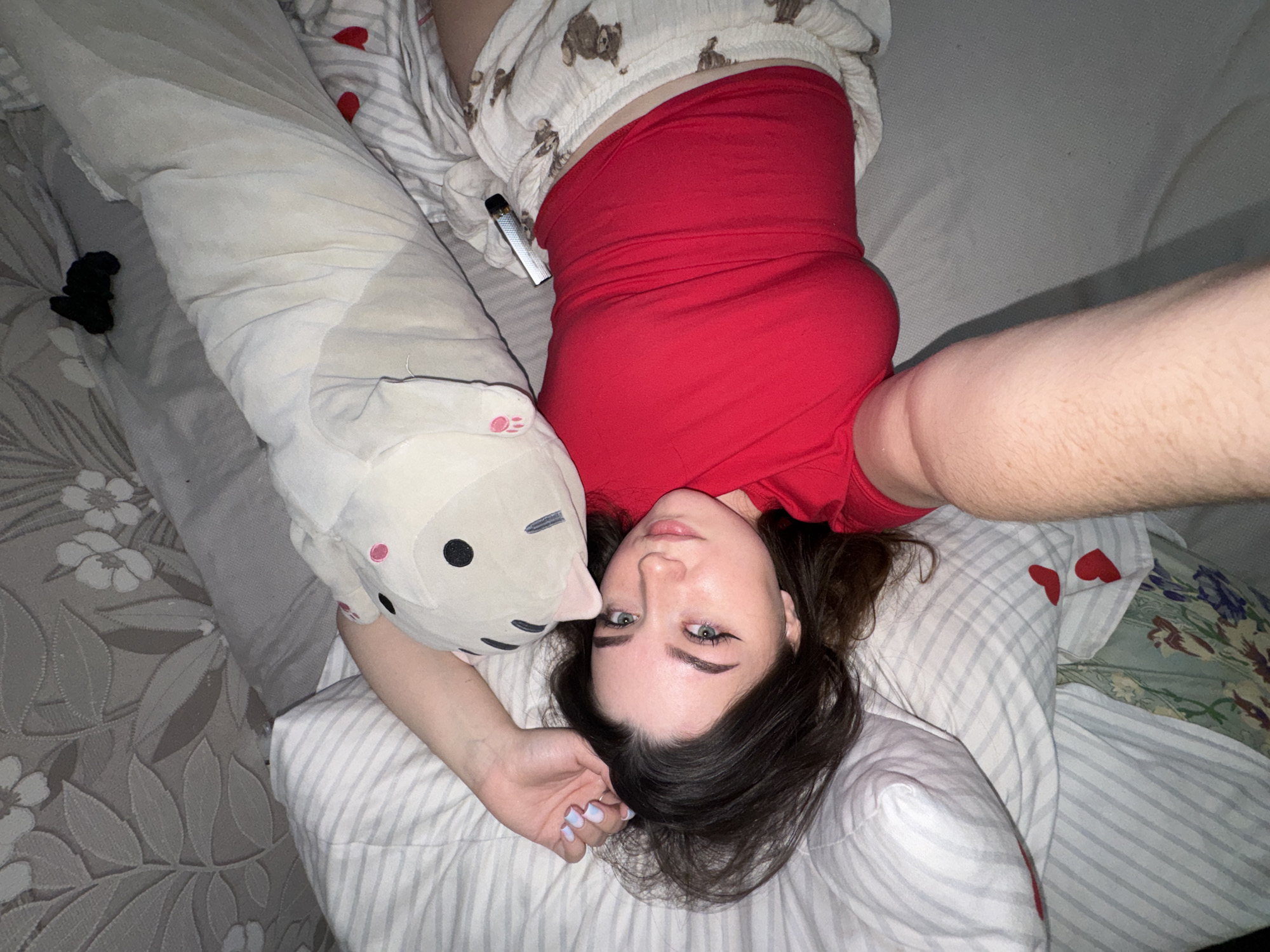 Woman photographed on bed in Bashkultaevo, Russia