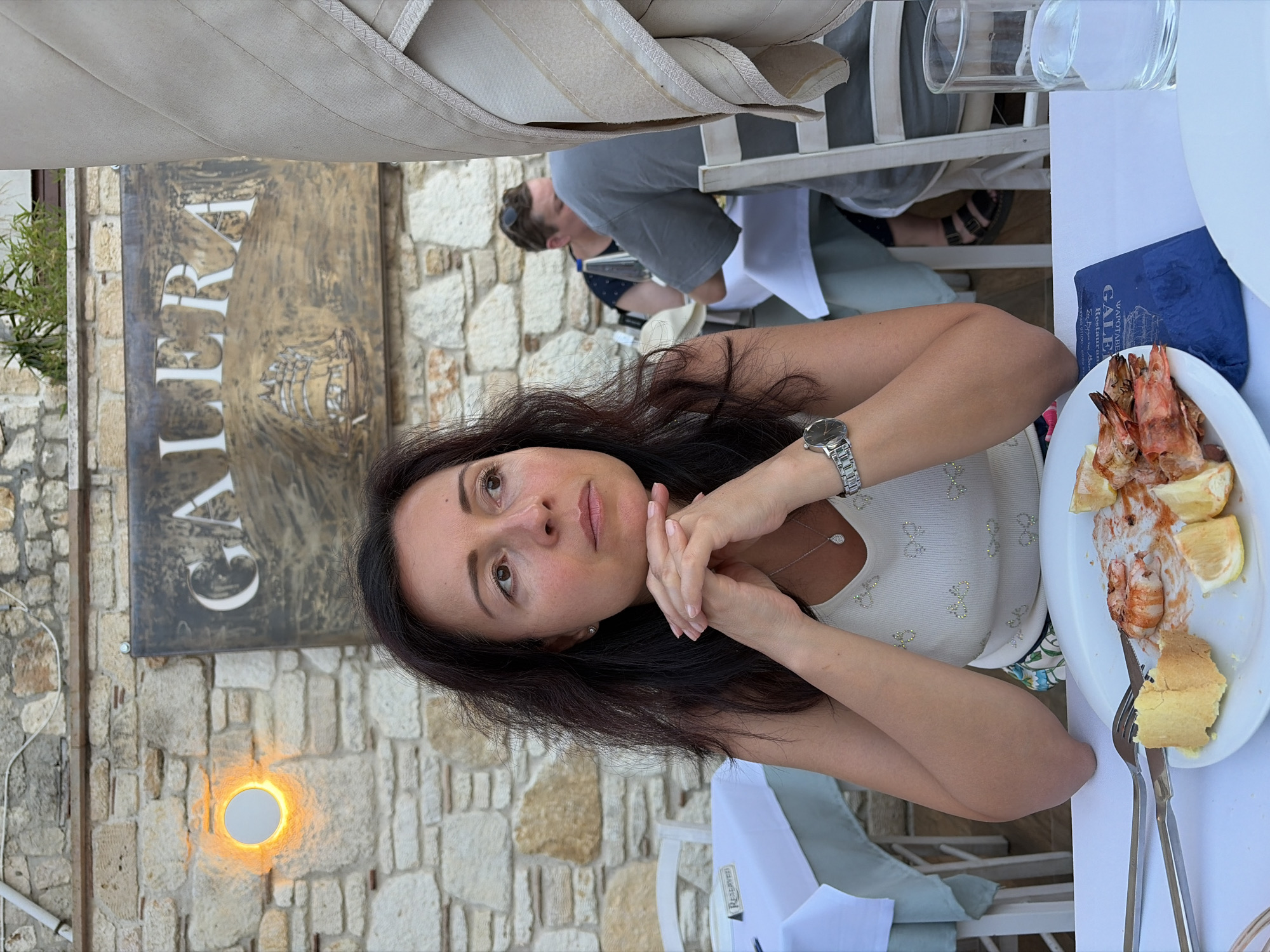 Dining out in Kassandra with a soccer match on in the background